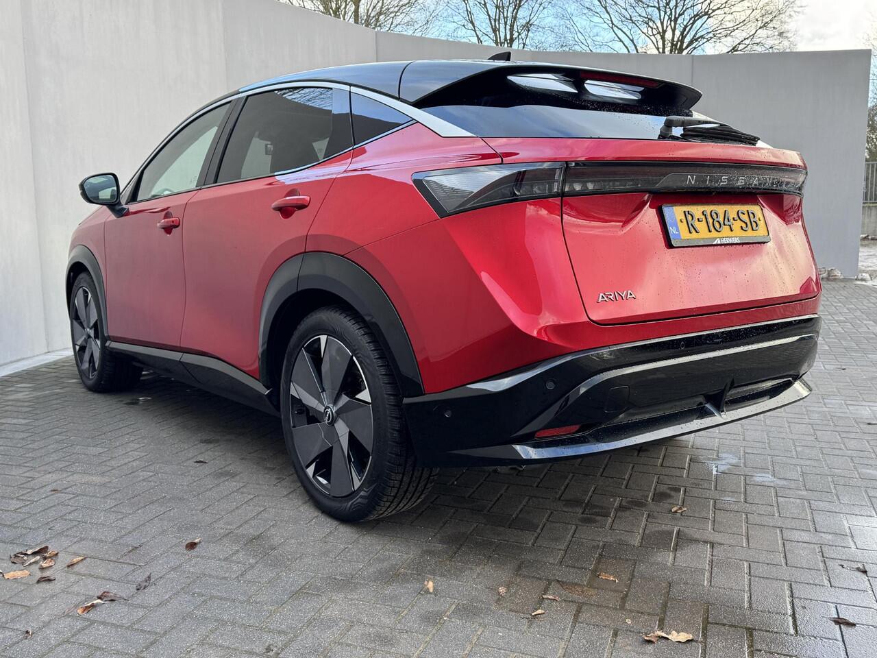 Nissan Ariya Evolve 91 kWh / Warmtepomp / Stuur- & Stoelverwarming / Voorruitverwarming / Geventileerde Voorstoelen / Binnenspiegel Camera / Schuif & Kanteldak / Head-Up Display / Bose Premium Audio / Adaptieve Cruise Control / Apple Carplay & Android Auto /