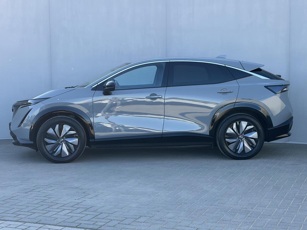 Nissan Ariya Advance 66 kWh / SOH 99% / Apple Carplay & Android Auto / 360 Graden camera / Elektrische achterklep / Adaptieve cruise control / 100% Dealeronderhouden