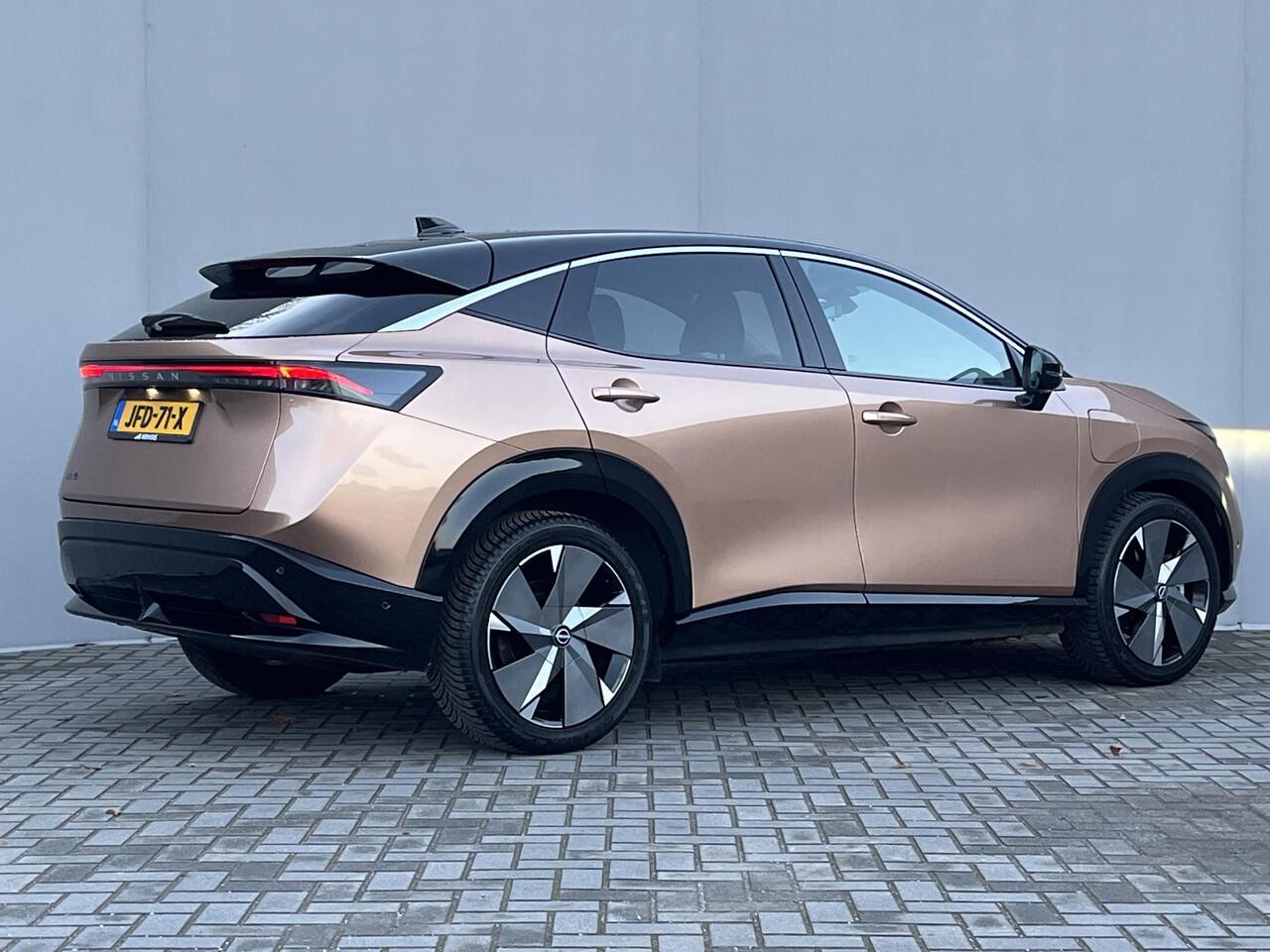 Nissan Ariya Evolve 91 kWh Automaat / WLTP bereik 516 km / Trekgewicht 750 kg / CCS snelladen / Elektrisch Glazen Schuif- en Kanteldak / Elektrisch Verstelbare Voorstoelen met geheugenset / Adaptieve Cruise Control / Keyless Entry & Start / Stoelventilatie / Stuur-,