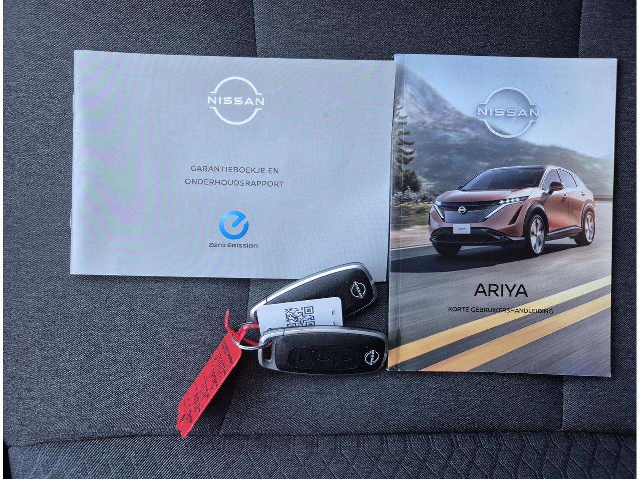 Nissan Ariya Advance 66 kWh Automaat / Accu SOH 99% / Fabrieksgarantie tot 02-2027 / CCS snelladen / Elektrische achterklep / Stuur-& Stoel verwarming / Adaptief cruise control / 360 camera / warmtepomp / Apple Carplay Android Auto /