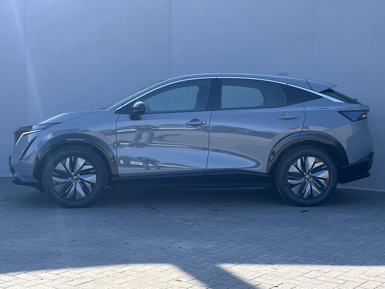 Nissan Ariya Limited Edition 91 kWh / ¤ 3.500,- Prijsverlaging + ¤ 3.000,- korting / NIEUW uit voorraad leverbaar! / Achteruitrijcamera / Apple Carplay & Android Auto / Navigatie full map / Keyless Entry & Start / Adaptieve Cruise Control / Climate Control /