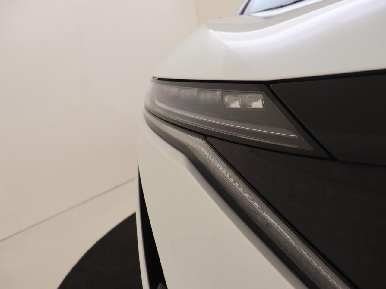 Nissan Ariya Evolve 91 kWh | Schuif-/Kanteldak | BOSE Audio | Head-Up Display | 20'' Inch Velgen | 360 Camera | Stoel- en Stuurverwarming | Apple CarPlay & Android Auto