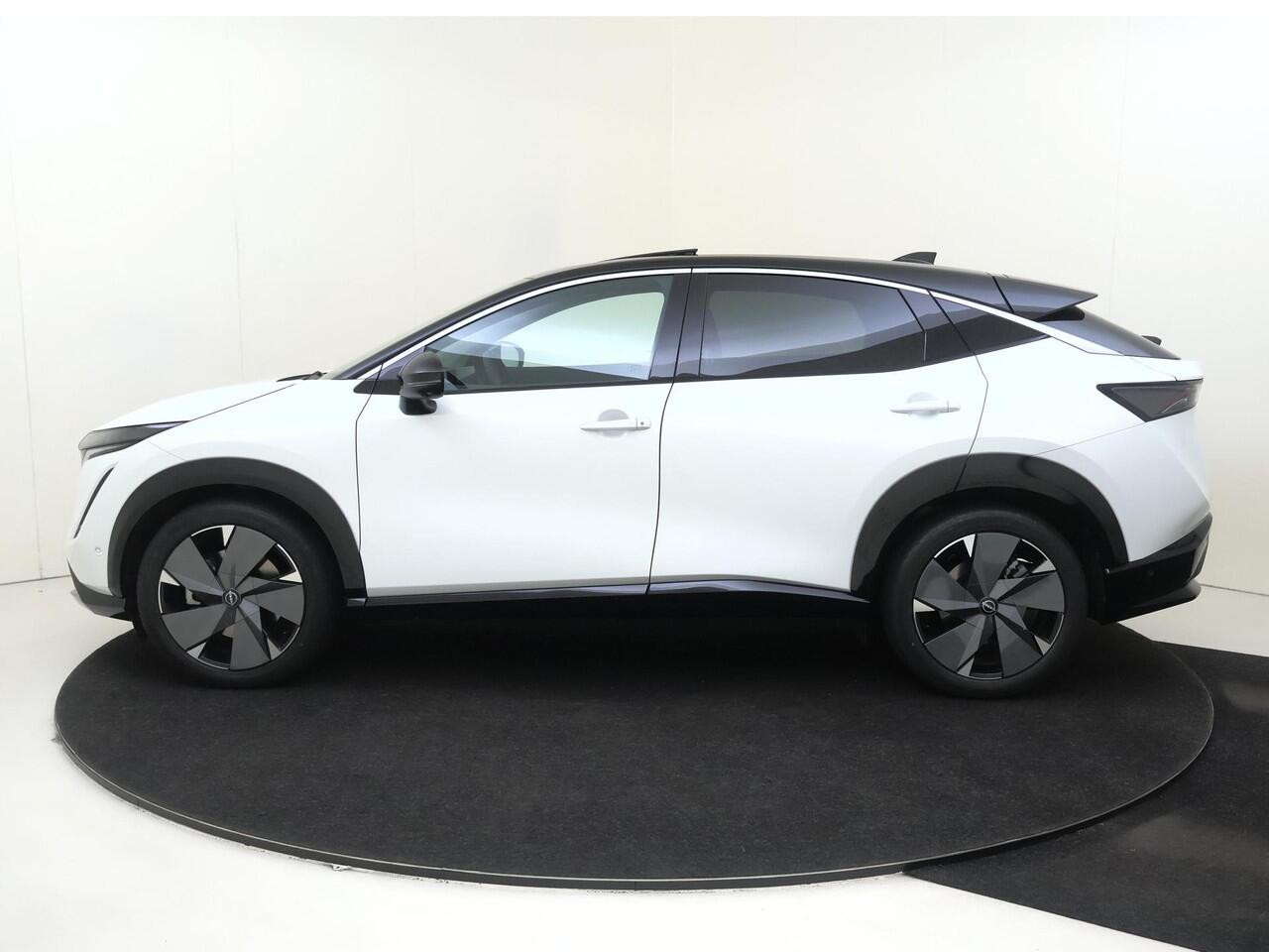 Nissan Ariya Evolve 91 kWh | Schuif-/Kanteldak | BOSE Audio | Head-Up Display | 20'' Inch Velgen | 360 Camera | Stoel- en Stuurverwarming | Apple CarPlay & Android Auto