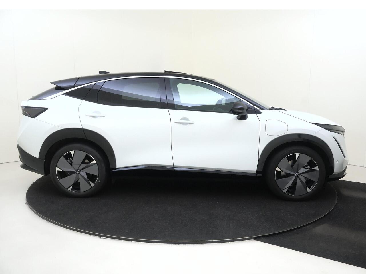 Nissan Ariya Evolve 91 kWh | Schuif-/Kanteldak | BOSE Audio | Head-Up Display | 20'' Inch Velgen | 360 Camera | Stoel- en Stuurverwarming | Apple CarPlay & Android Auto