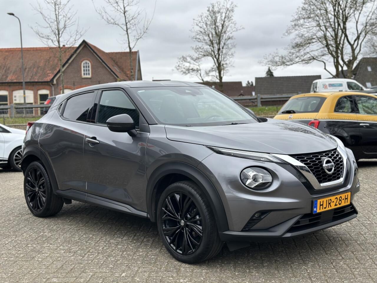 Nissan JUKE 1.0 DIG-T Enigma Camera*Stoelvw*Clima*Cruise*PDC