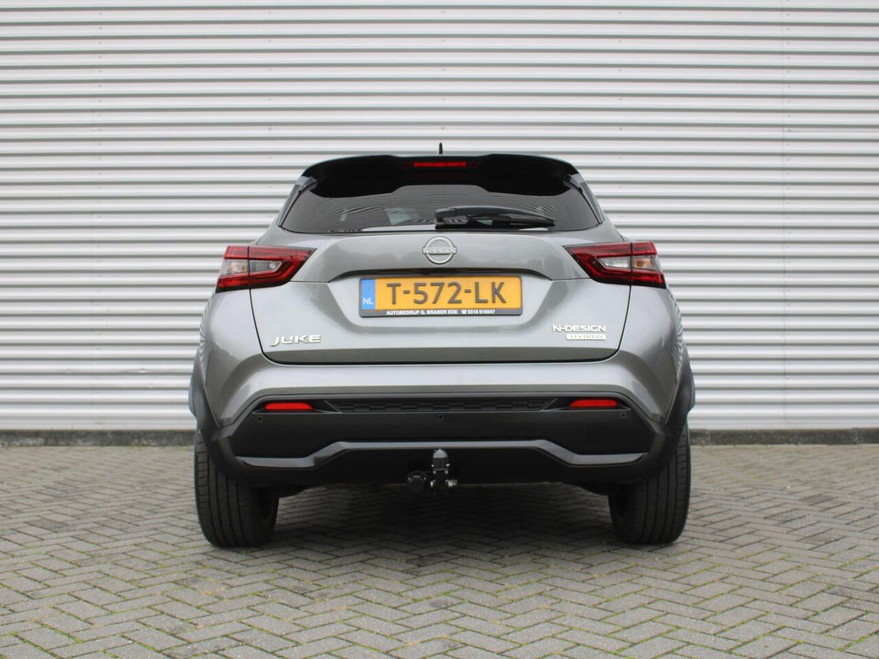 Nissan JUKE 1.6 Hybrid N-Design | Trekhaak | Stuur-/stoel-/voorruitverwarming | Camera | Clima | Navi | 19" LM | Cruise |