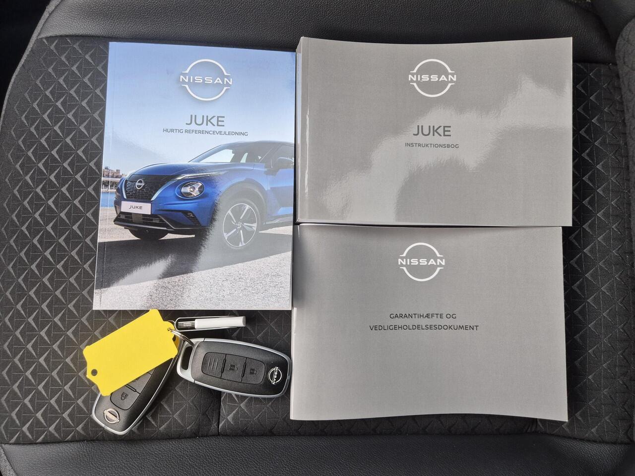 Nissan JUKE 1.0 DIG-T N-Connecta Automaat / Cold Pack / Apple Carplay Android Auto / Stuur-, Stoel en Voorruitverwarming / Achteruitrijcamera / Cruise control / Keyless Entry/Start / Draadloze telefoon lader / Climate control /