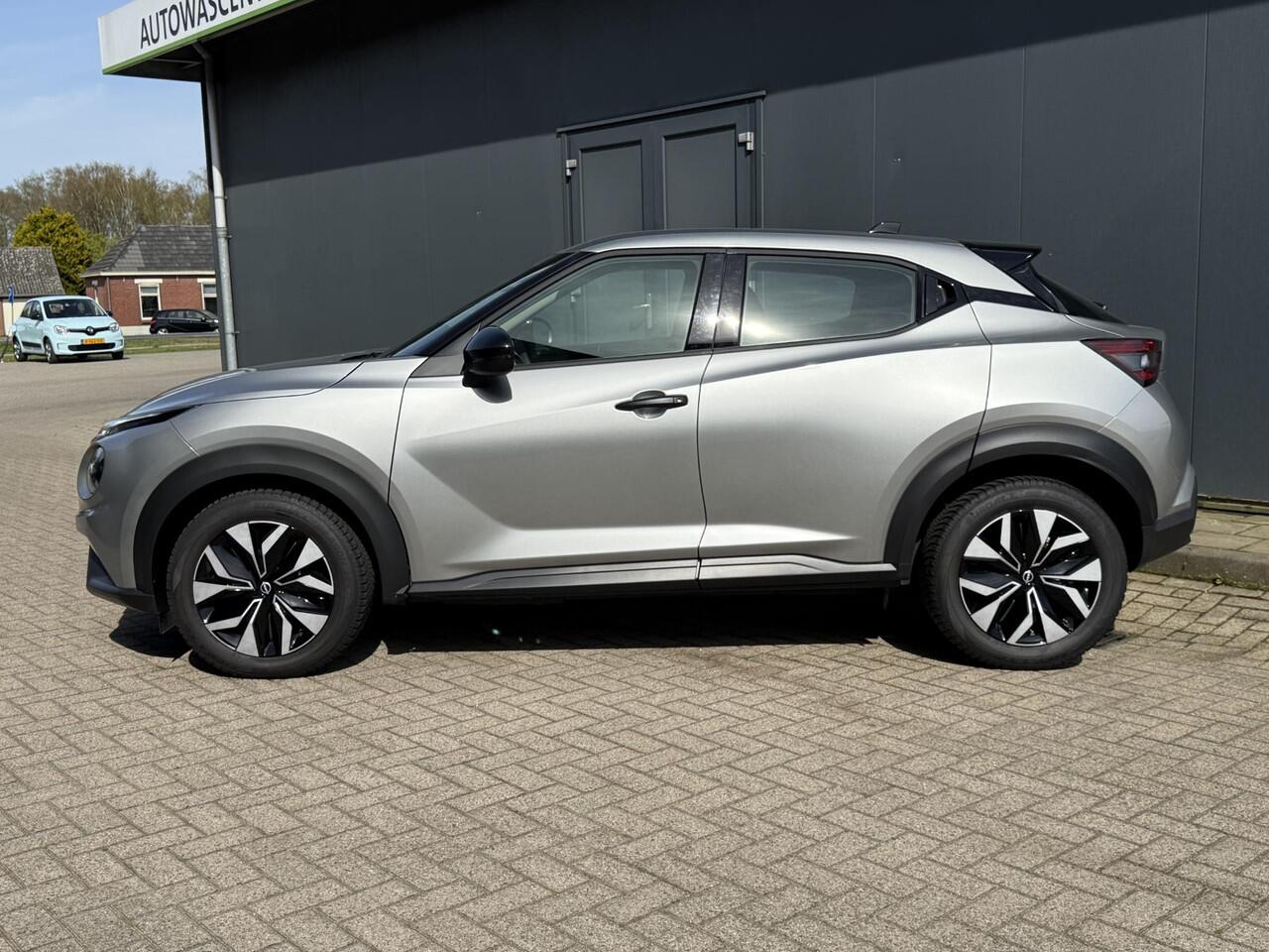 Nissan JUKE 1.0 DIG-T Acenta Handgeschakeld / Allseason banden / Apple Carplay Android Auto / Achteruitrijcamera / Stoelverwarming / Navigatie / Climate control / Cruise control / Lichtmetalen wielen 17" /