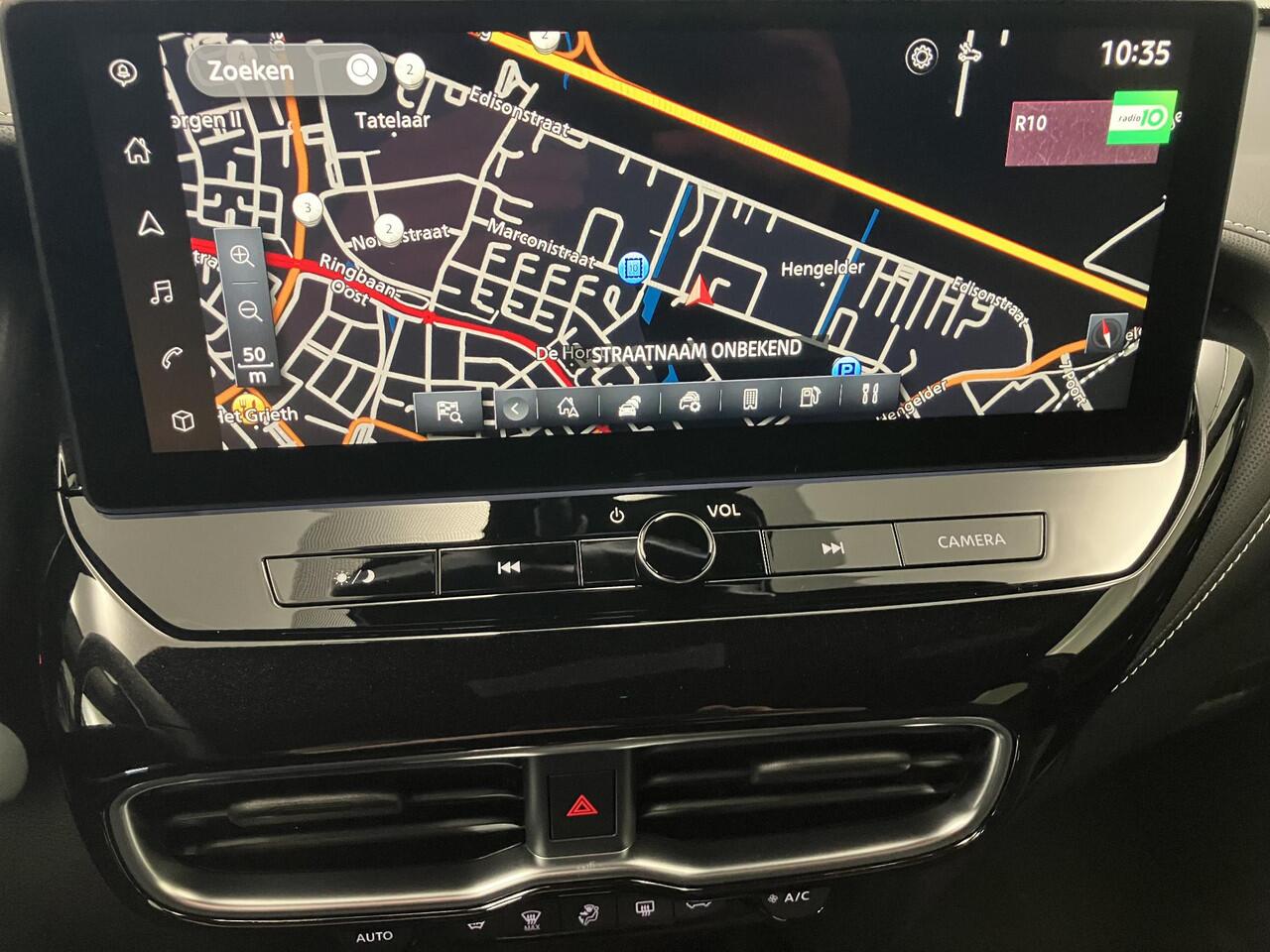 Nissan JUKE 1.6 Hybrid Tekna / ¤4.500,- Nissan Voorraadvoordeel / Nieuw uit voorraad leverbaar / Lederen Bekleding / Bose Premium Audio / Technology Pack /Stoel- en Stuurverwarming / Voorruitverwarming / 19 Inch Velgen /