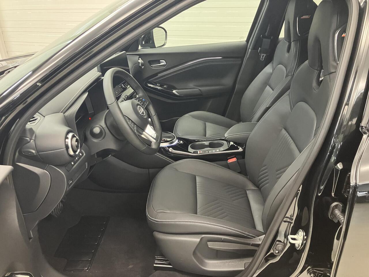 Nissan JUKE 1.6 Hybrid Tekna / ¤4.500,- Nissan Voorraadvoordeel / Nieuw uit voorraad leverbaar / Lederen Bekleding / Bose Premium Audio / Technology Pack /Stoel- en Stuurverwarming / Voorruitverwarming / 19 Inch Velgen /