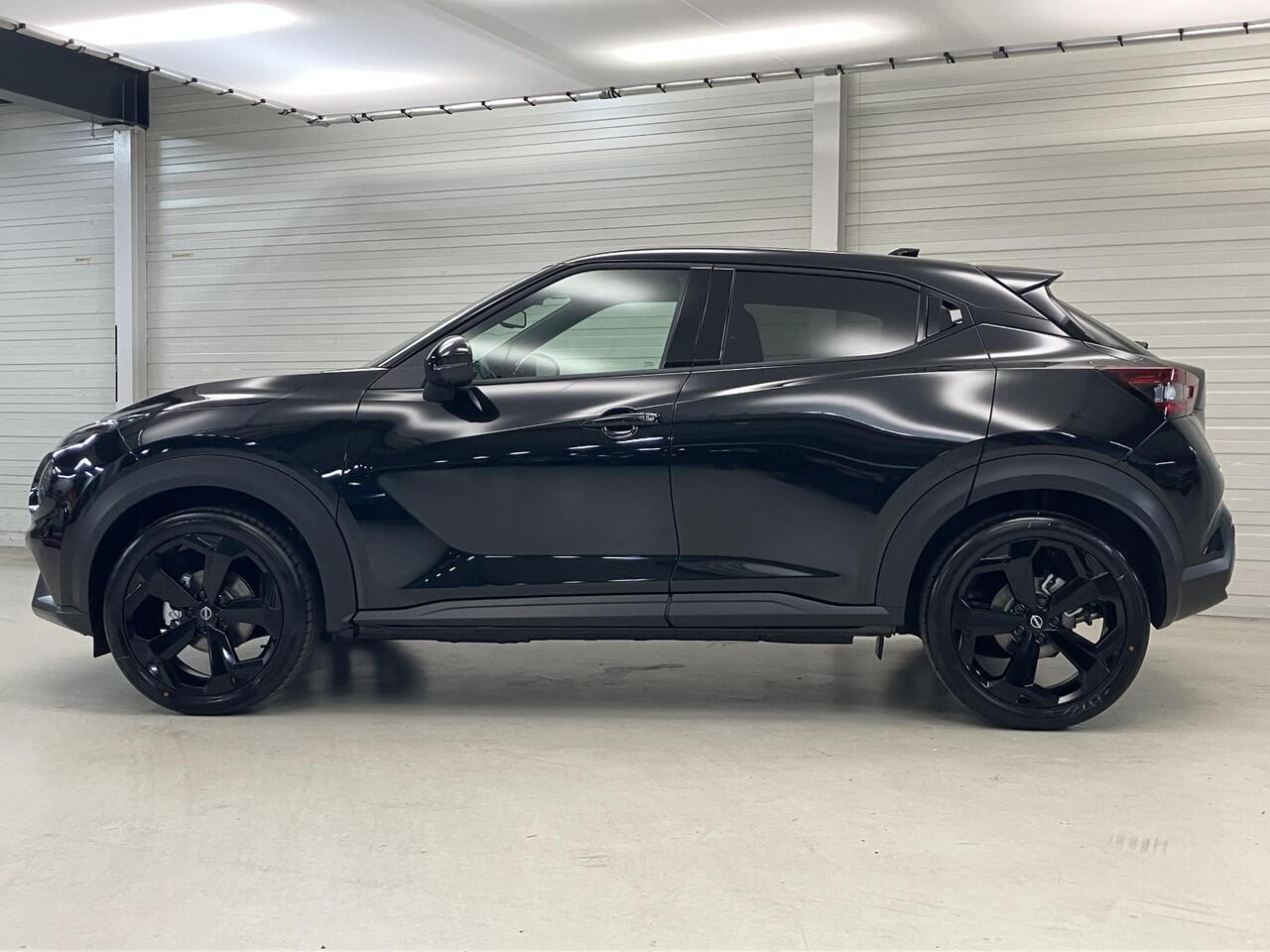 Nissan JUKE 1.6 Hybrid Tekna / ¤4.500,- Nissan Voorraadvoordeel / Nieuw uit voorraad leverbaar / Lederen Bekleding / Bose Premium Audio / Technology Pack /Stoel- en Stuurverwarming / Voorruitverwarming / 19 Inch Velgen /