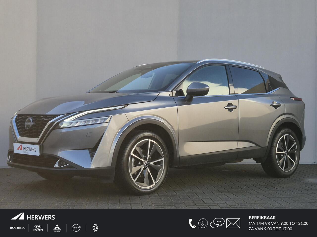 Nissan QASHQAI 1.3 MHEV Xtronic Tekna Plus Automaat / HUD / Panoramadak / Allseason banden / Trekgewicht 1800 kg / Elektrische achterklep / Stoel met massage functie / Rondomzicht camera / Stuur-, Stoel en Voorruit verwarming / Bose Audio Systeem /
