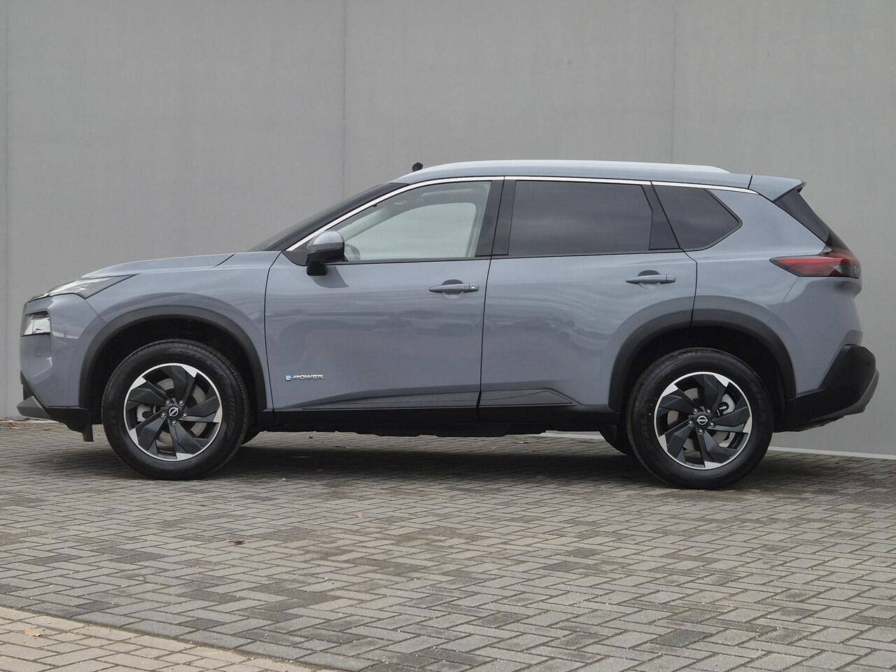 Nissan X-TRAIL 1.5 e-Power Tekna Automaat / HUD / Glazen schuif- en kanteldak / Elektrische achterklep / Stuur-, Stoel en Achterbank verwarming / Rondomzicht camera / Adaptief CC / Apple Carplay Android Auto / Voorruit verwarming /