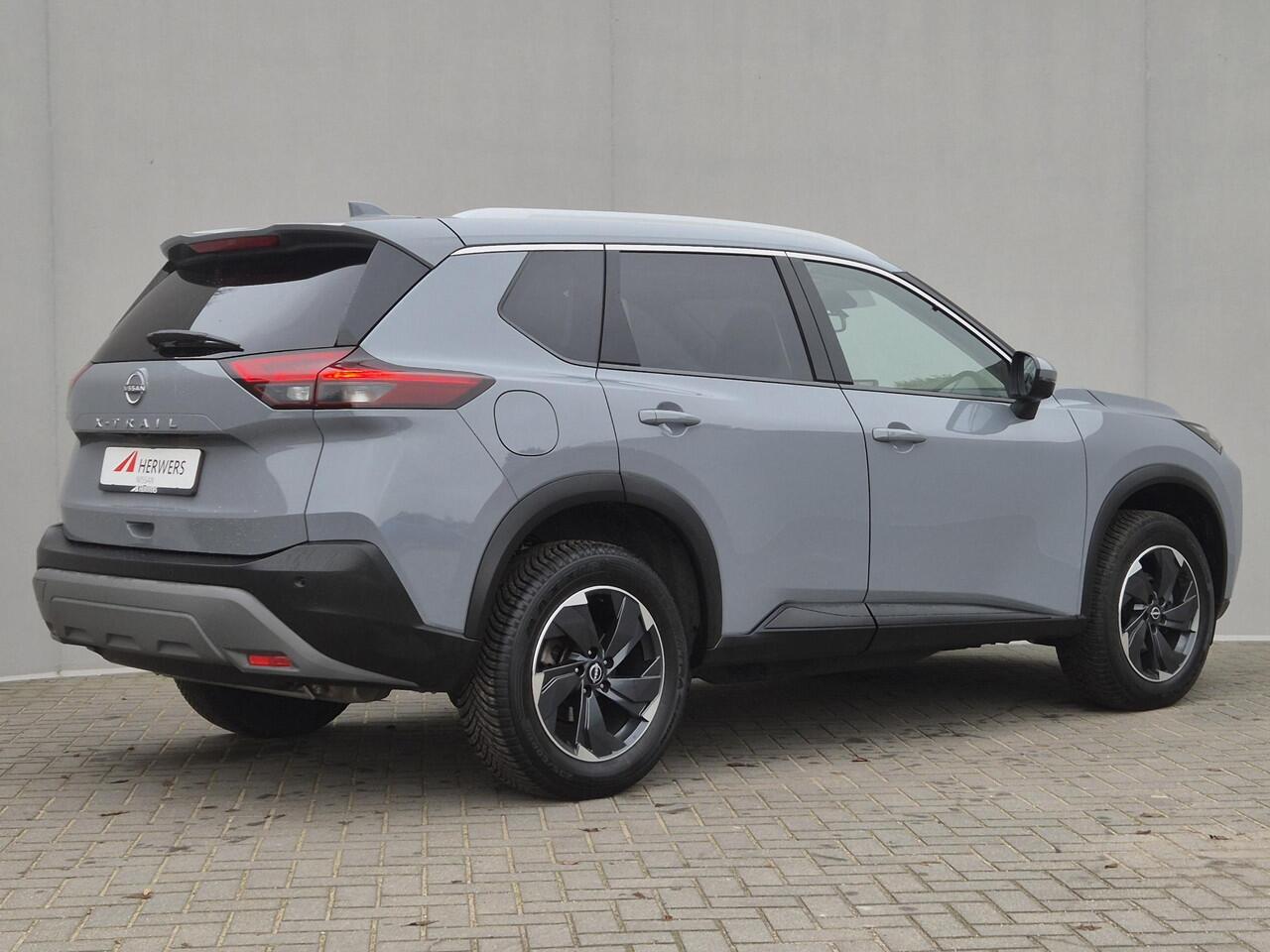 Nissan X-TRAIL 1.5 MHEV 163pk Tekna Automaat / Fabrieksgarantie tot 03-2028 <100.000 / 2000kg Trekgewicht / Allseason banden / HUD / Glazen schuif- en kanteldak / Elektrische achterklep / Rondomzicht camera / Stuur-, Stoel en Achterbank verwarming / Adaptief CC /