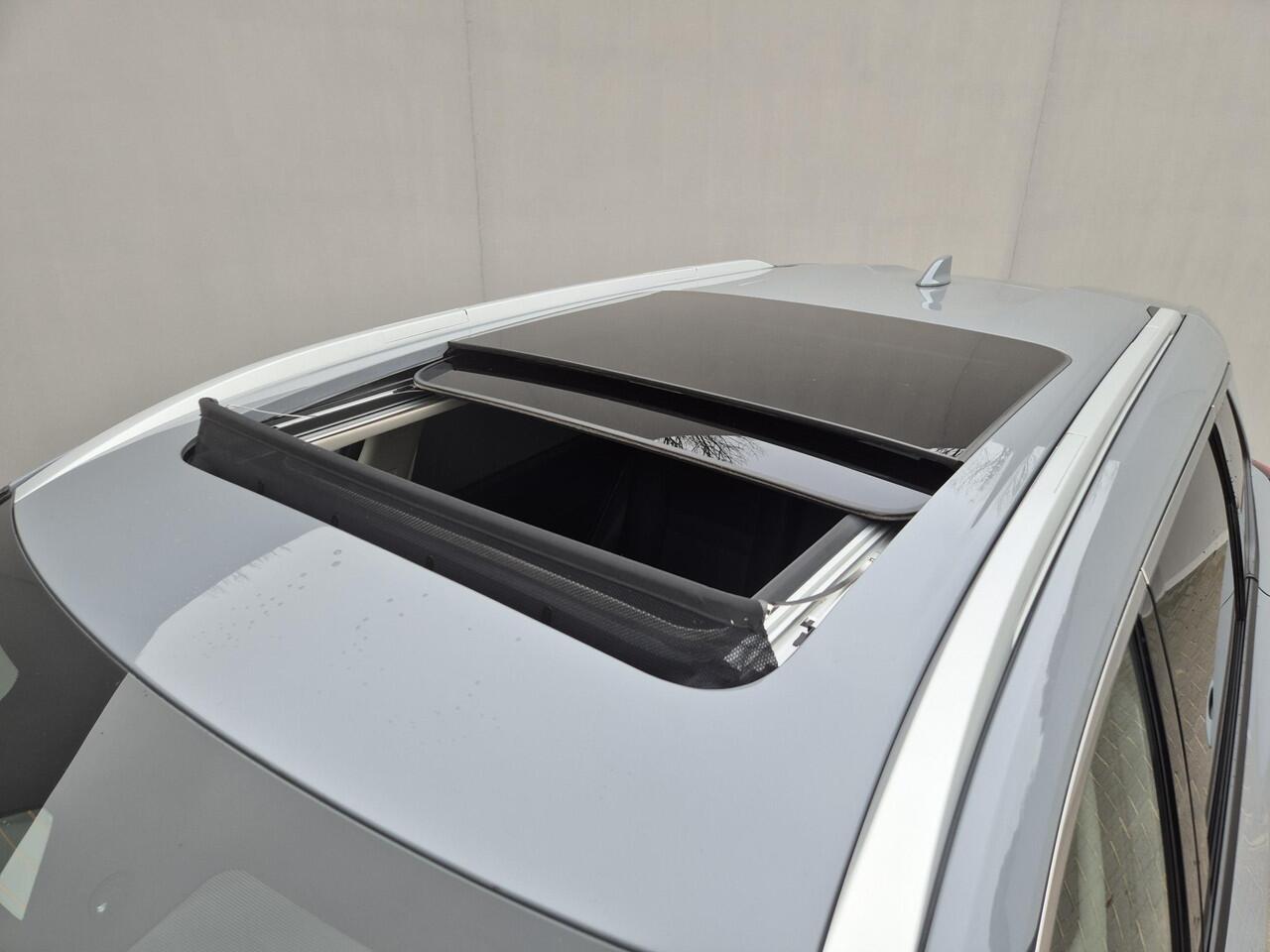 Nissan X-TRAIL 1.5 MHEV 163pk Tekna Automaat / Fabrieksgarantie tot 03-2028 <100.000 / 2000kg Trekgewicht / Allseason banden / HUD / Glazen schuif- en kanteldak / Elektrische achterklep / Rondomzicht camera / Stuur-, Stoel en Achterbank verwarming / Adaptief CC /