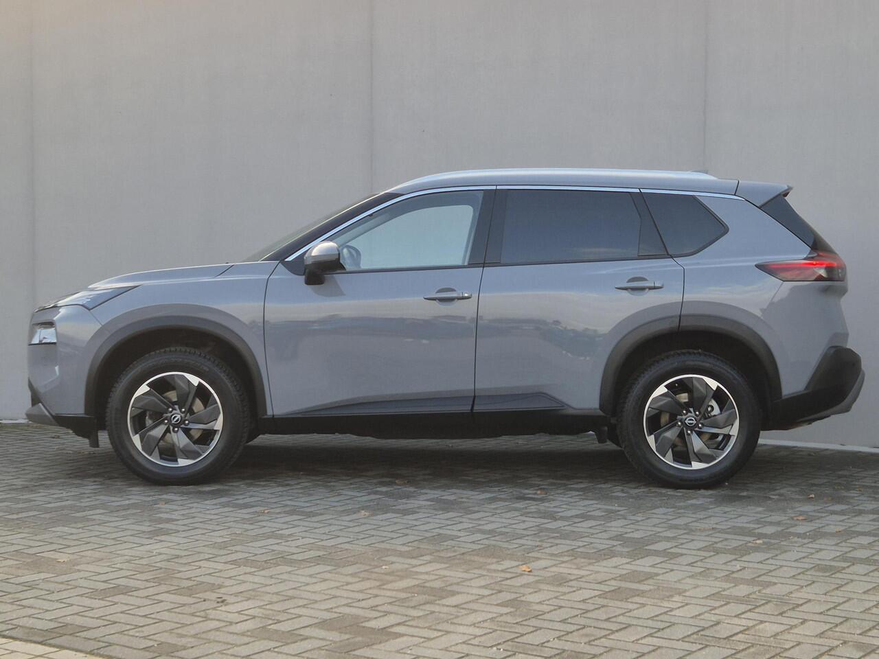 Nissan X-TRAIL 1.5 MHEV 163pk Tekna Automaat / Fabrieksgarantie tot 28-04-2028 / Trekgewicht 2000 kg / Allseason banden / HUD / Elektrische achterklep / Stuur-, Stoel en Achterbank verwarming / Rondomzicht camera /