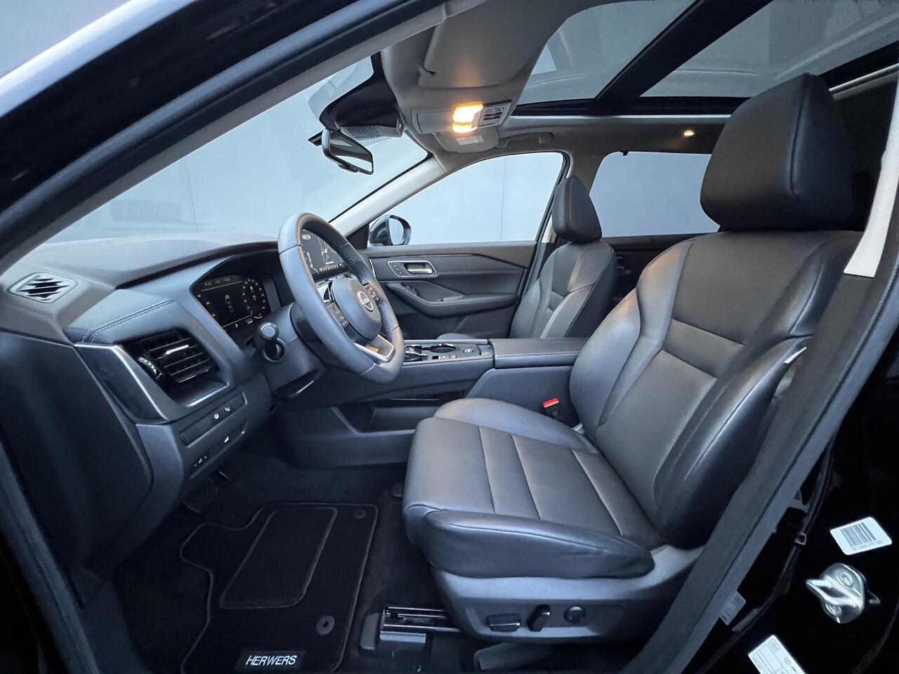 Nissan X-TRAIL 1.5 e-Power Tekna Automaat / Fabrieksgarantie tot 03-2028 < 100.000km / Leder / Panorama schuifdak / Elektrische stoelen en klep / Stuur-, stoel- & achterbankverwarming / Navi / HUD / Camera 360° / LM 19" wielen + All Season banden /