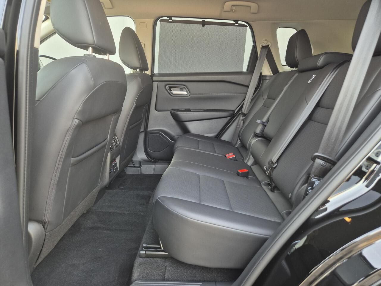 Nissan X-TRAIL 1.5 e-Power Tekna Automaat / Fabrieksgarantie tot 05-2028 / Dealer onderhouden / All Season banden / Stuur-, Stoel en Achterbank verwarming / Head Up Display / Elektrische achterklep / Rondomzicht camera / Adaptief CC /