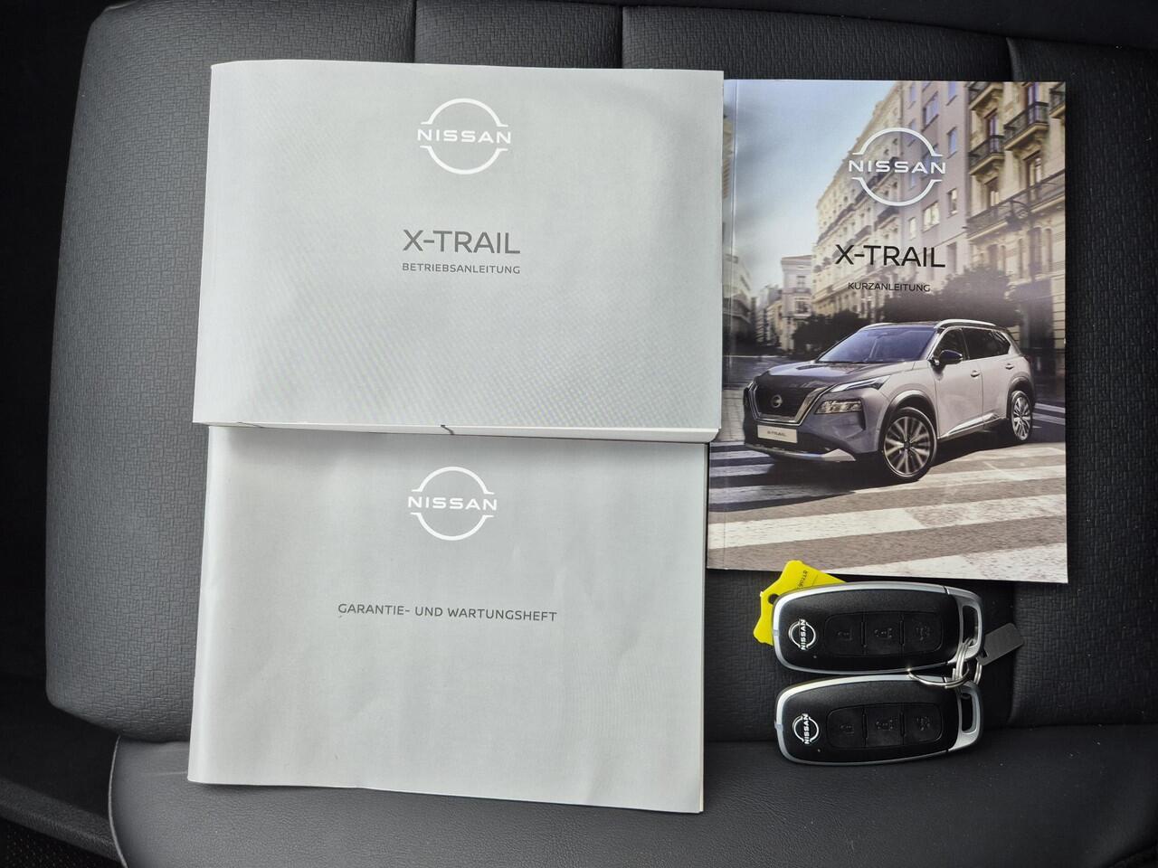 Nissan X-TRAIL 1.5 e-Power Tekna Automaat / Fabrieksgarantie tot 05-2028 / Dealer onderhouden / All Season banden / Stuur-, Stoel en Achterbank verwarming / Head Up Display / Elektrische achterklep / Rondomzicht camera / Adaptief CC /