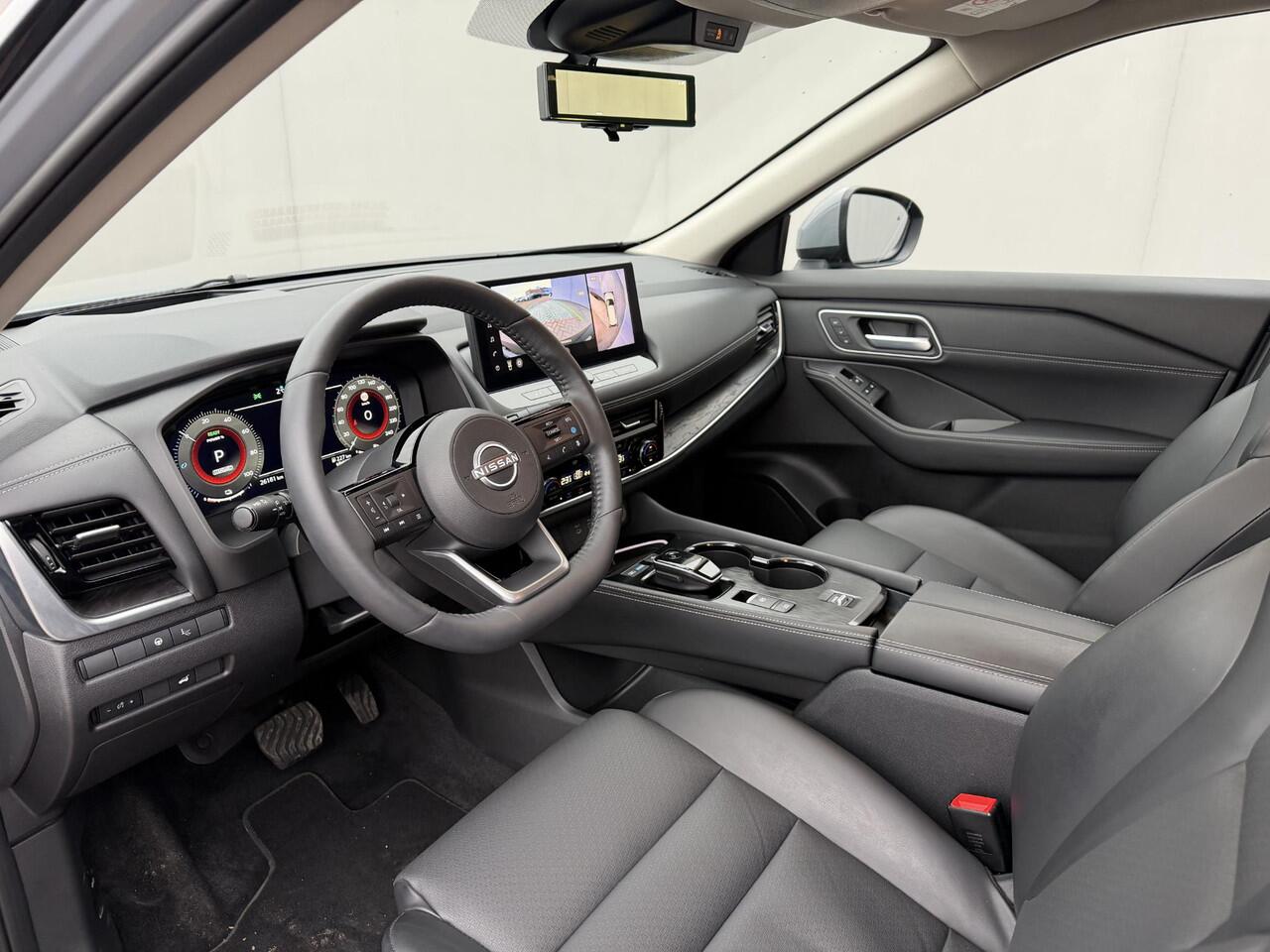 Nissan X-TRAIL 1.5 e-Power Tekna / Fabrieksgarantie tot 3-2028 / Dealer Onderhouden / HUD / 360 Camera / Lederen Bekleding / Adaptieve Cruise / Elektr. Stoelen + Memory / Elektr. Achterklep / Dodehoek Detectie / DAB / LED /