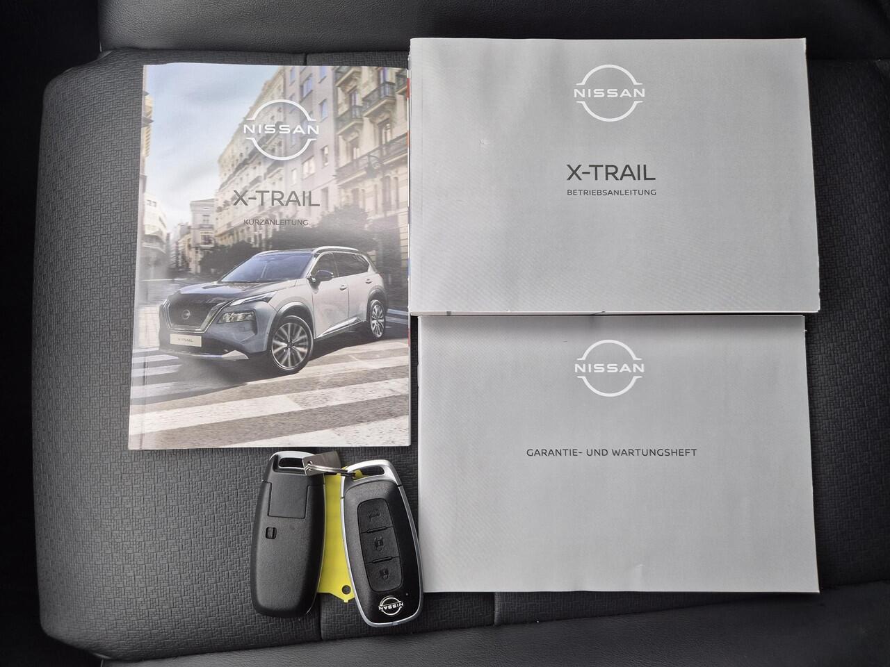 Nissan X-TRAIL 1.5 e-Power Tekna Automaat / Fabrieksgarantie tot 05-2028<100.000 / Dealer onderhouden / All Season banden / Head Up Display / Adaptief cruise control / Stuur-, Stoel & Achterbank verwarming / Elektrische achterklep /