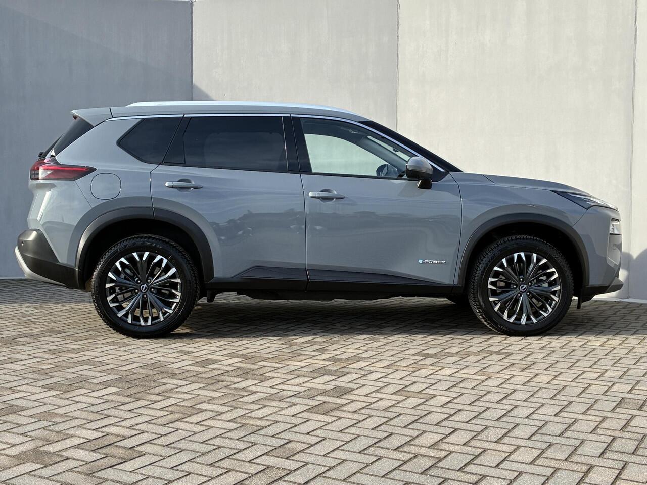 Nissan X-TRAIL 1.5 e-Power Tekna / Fabrieksgarantie t/m 05-2028 / Apple Carplay/Android Auto / Adaptieve Cruise Control / Stoel-/Stuur-/Voorruitverwarming / Elektrische Achterklep / All-Season banden / Navigatie / Achteruitrijcamera /