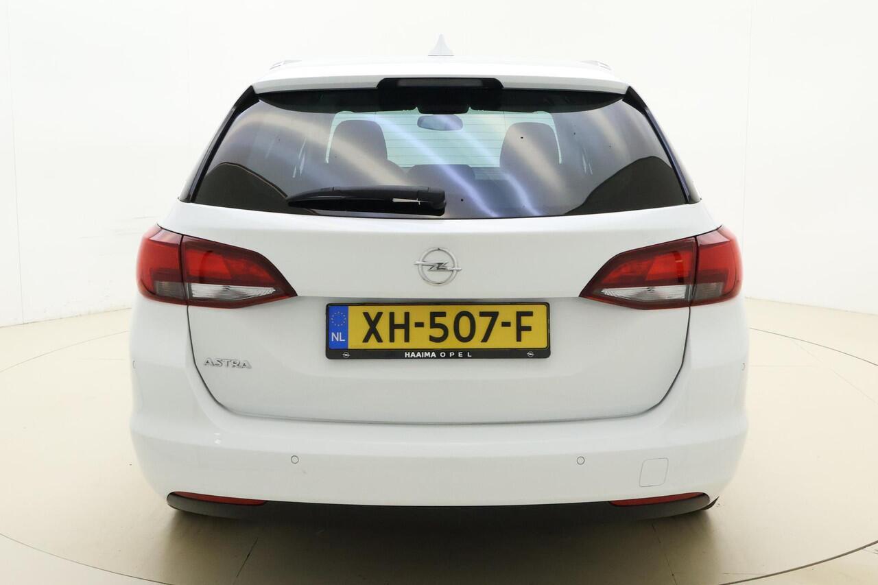 Opel ASTRA Sports Tourer 1.0 Turbo 105pk Online Edition | Navigatie | Climate control | Getint glas | Cruise control | Bluetooth | Parkeersensoren | Dakrails | DAB Radio