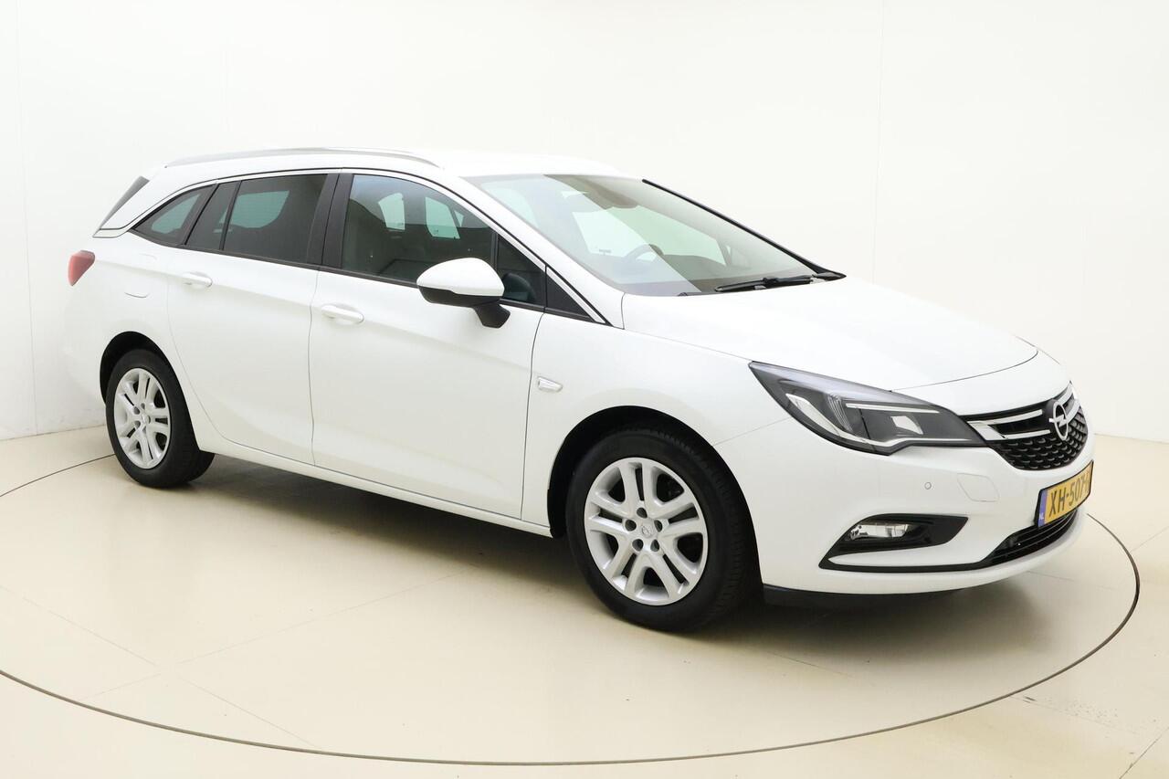 Opel ASTRA Sports Tourer 1.0 Turbo 105pk Online Edition | Navigatie | Climate control | Getint glas | Cruise control | Bluetooth | Parkeersensoren | Dakrails | DAB Radio