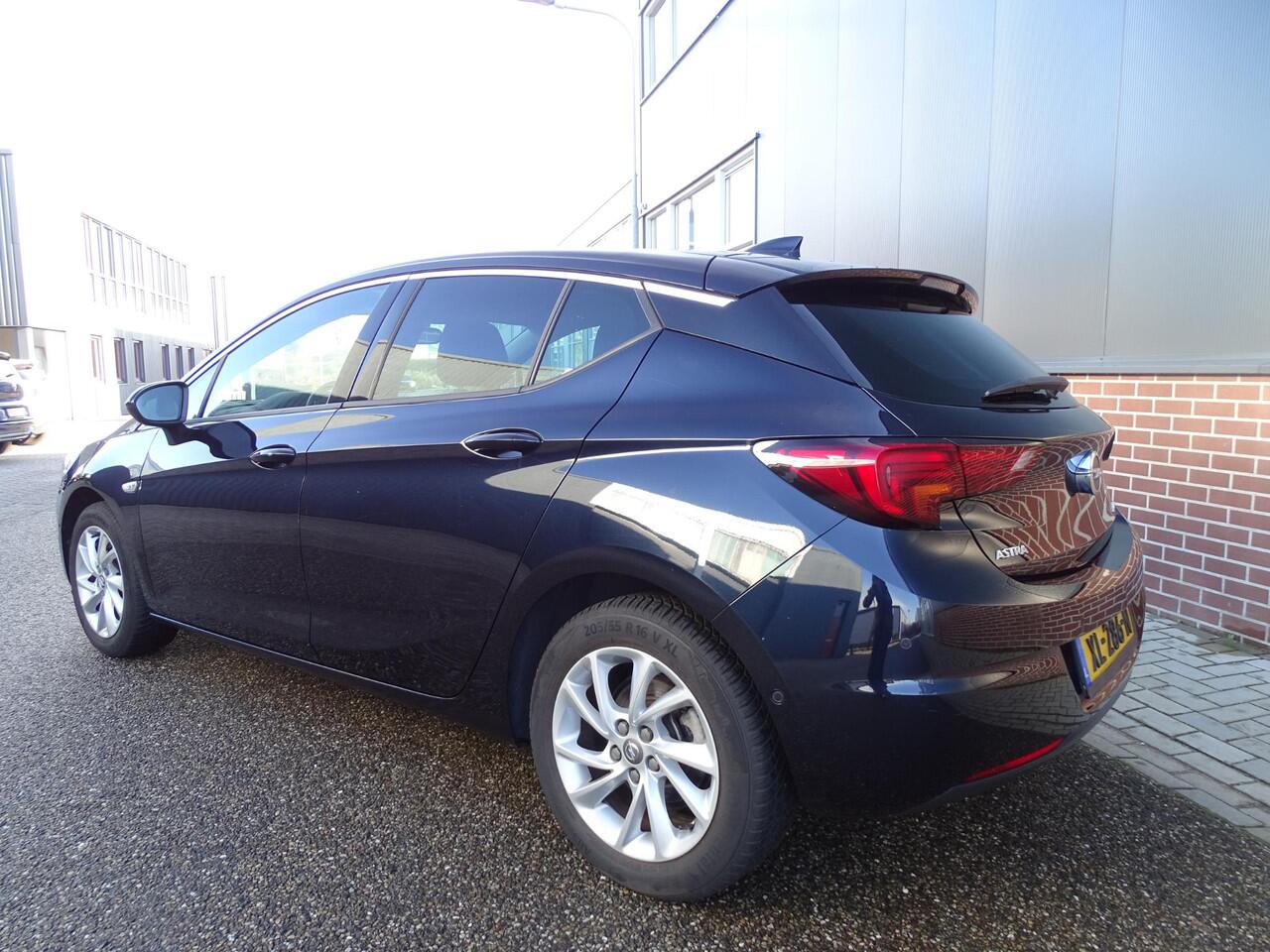 Opel ASTRA 1.4 Innovation DODEHOEK DETECTIE | NAVIAGTIE | ACHTERUIT RIJ CAMREA | PARKEER SENSOREN | KEYLESS GO/ENTRY | APPLE CARPLAY / ANDROID | CRUISE CONTROL | AIRCO\ECC | LED| BI-XENON KOPLAMPEN |