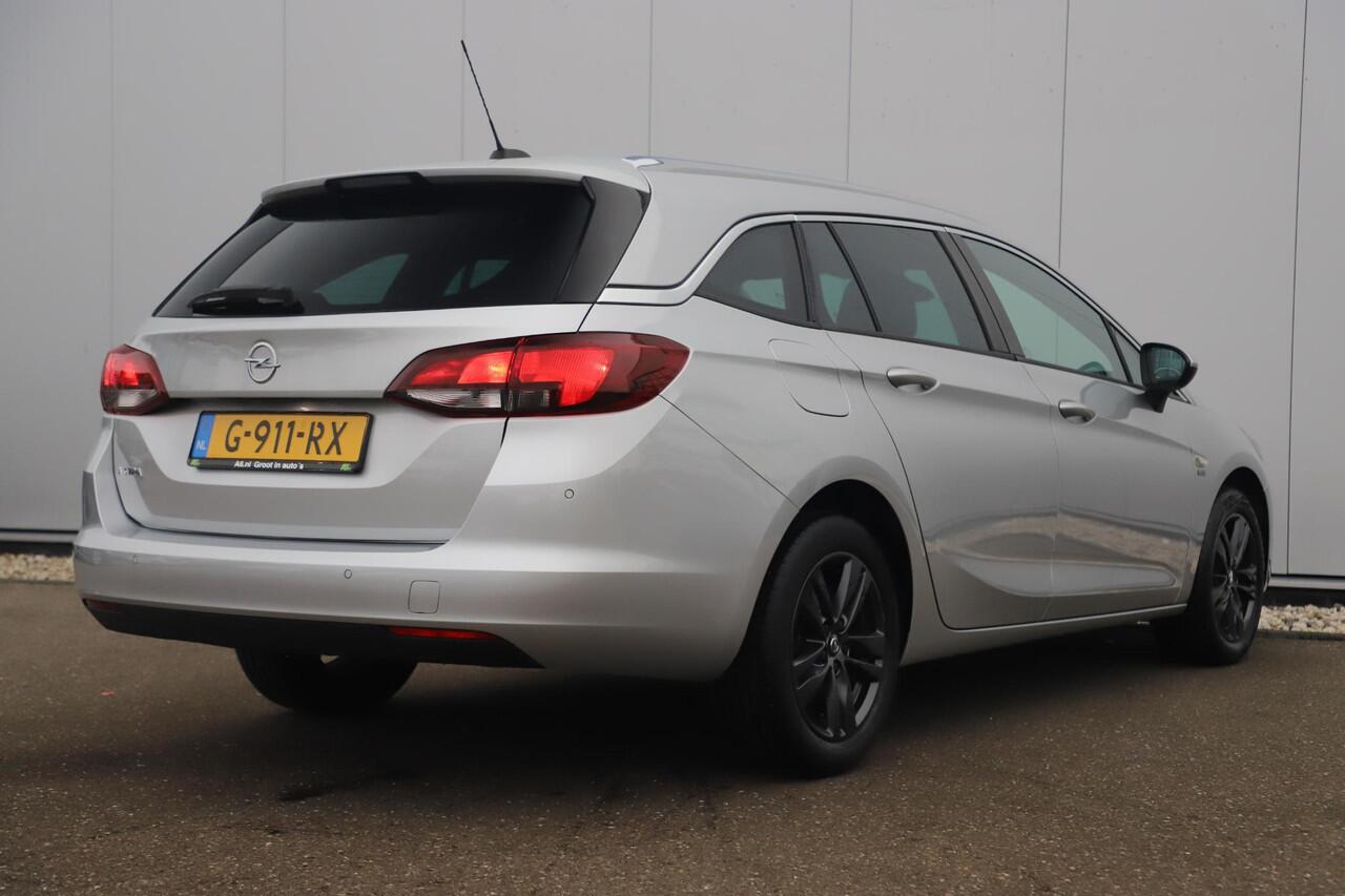 Opel ASTRA Sports Tourer 1.0 Turbo 120 Jaar Edition 16 inch Navigatie Carplay Android Clima Cruise Parkeersensor Getint Glas