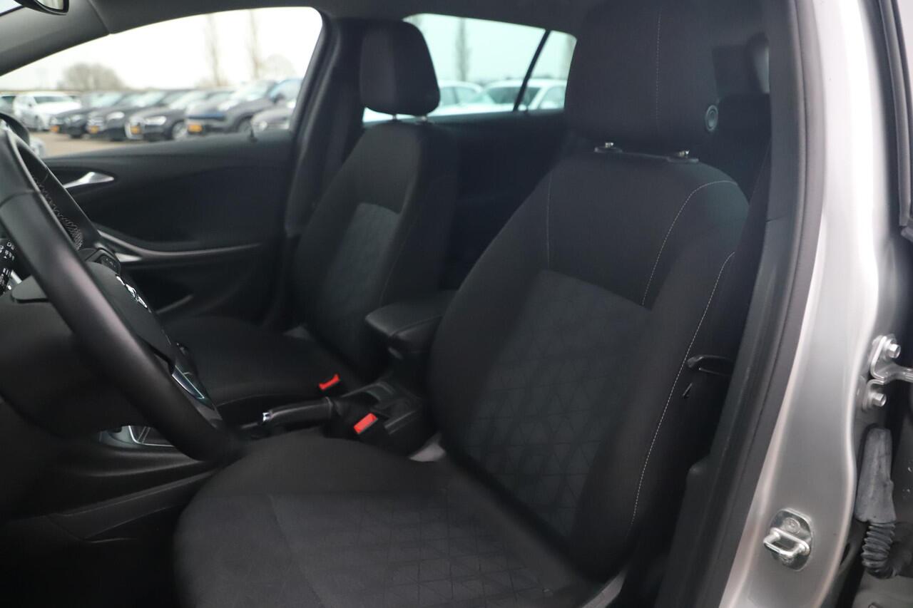 Opel ASTRA Sports Tourer 1.0 Turbo 120 Jaar Edition 16 inch Navigatie Carplay Android Clima Cruise Parkeersensor Getint Glas