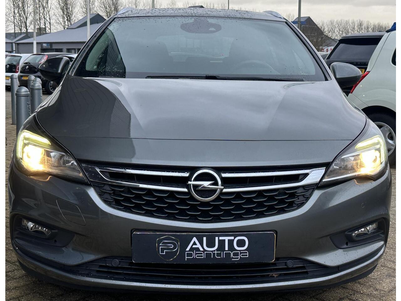 Opel ASTRA Sports Tourer 1.4 Turbo 120 Jaar Edition 150PK | AUTOMAAT | ZEER NETTE STAAT | Trekhaak | Stoel en Stuur Verwarming | APK tot 29-04-2027 |