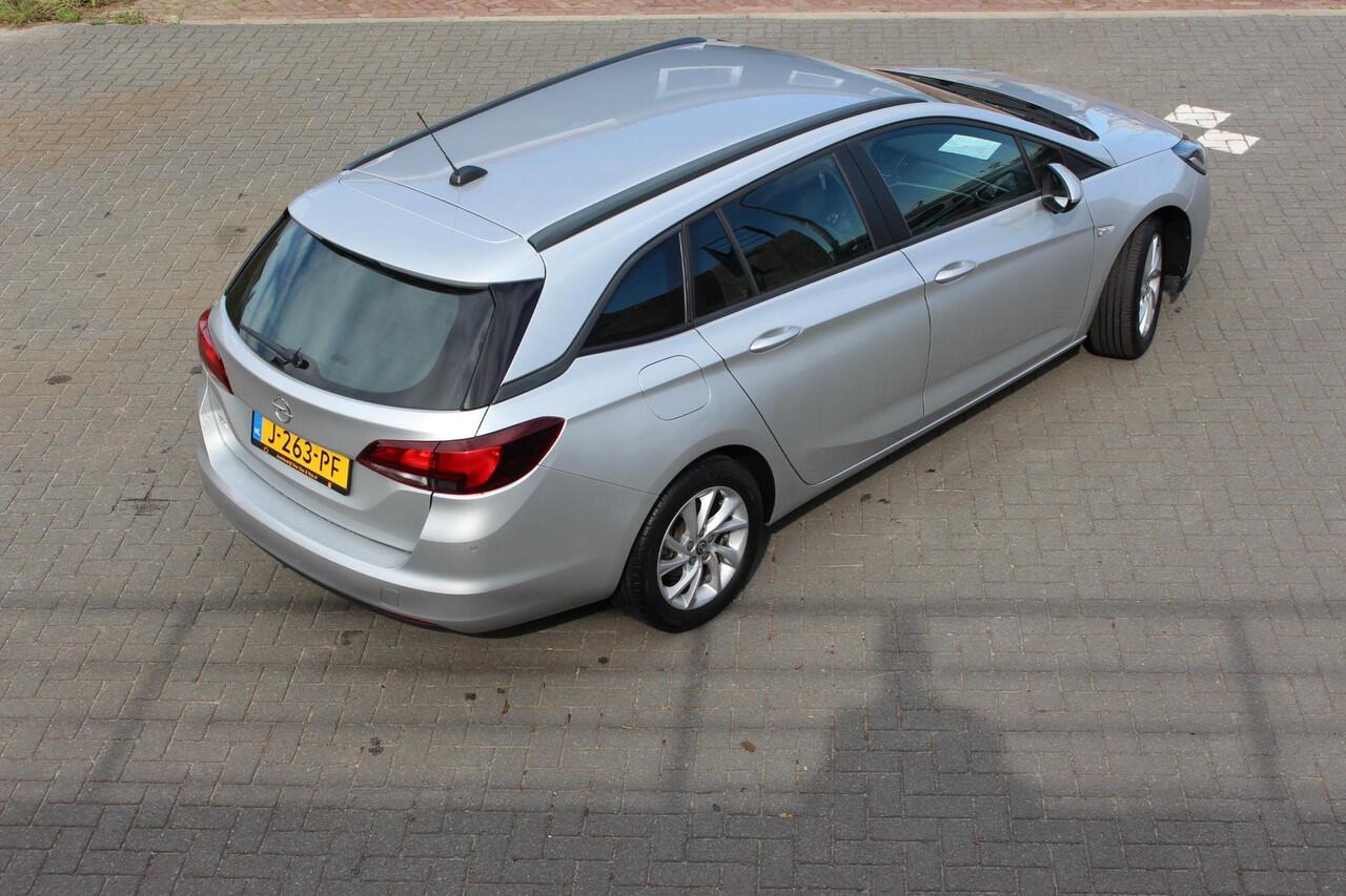Opel ASTRA Sports Tourer 1.2 Edition 131PK , AGR stoel,carplay android, Navi, Camera, climate + cruise control,1e eigenaar.