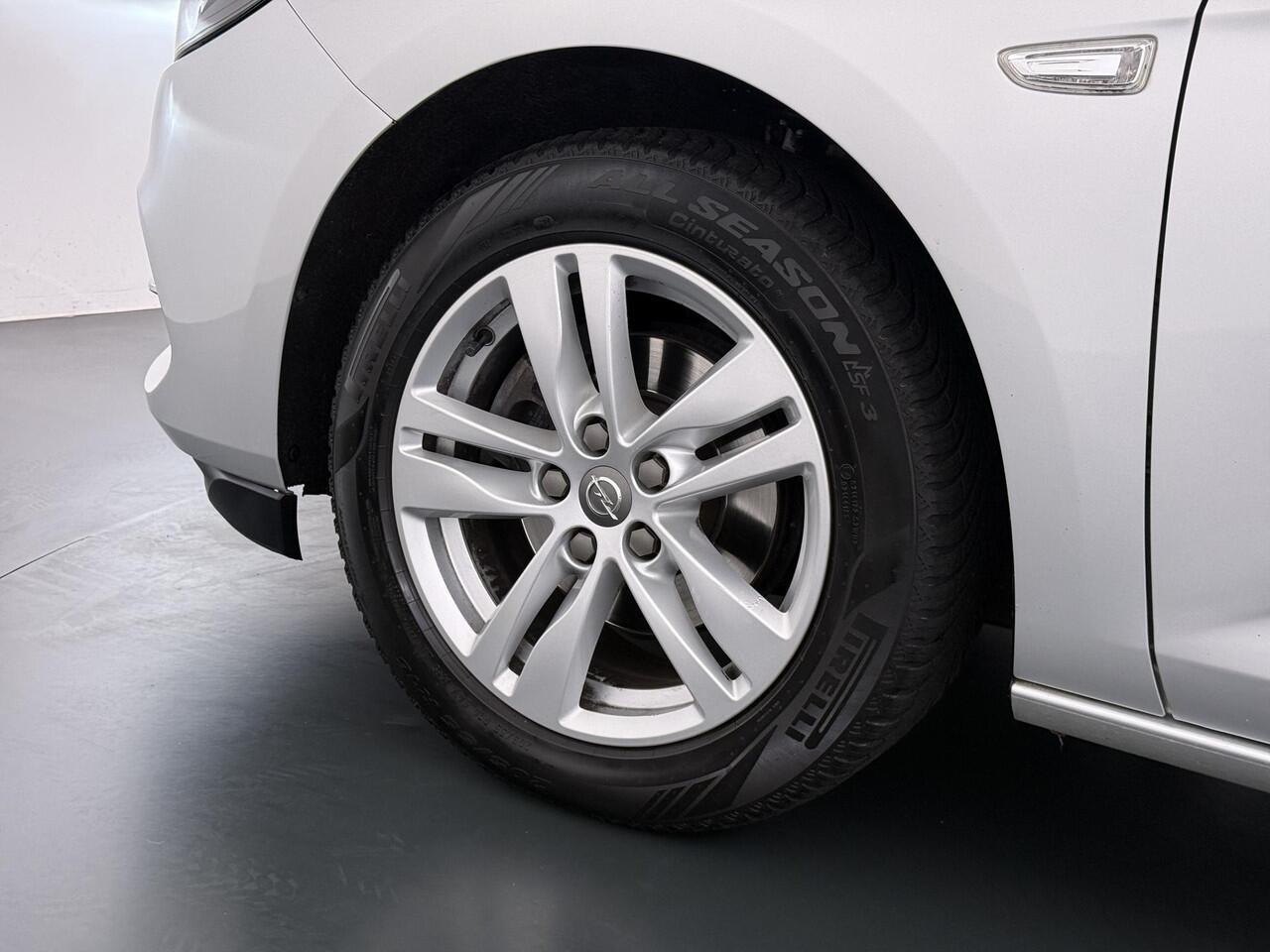 Opel ASTRA 1.4 Launch Elegance VAN ¤ 18.900 ,- VOOR ¤ 15.877,- UW LENTEVOORDEEL ¤ 3.023,-! | AUTOMAAT | AGR STOELEN | CAMERA | STOEL- & STUURWIELVERWARMING | NAVIGATIE | GOED ONDERHOUDEN | AFNEEMBARE TREKHAAK | INCL. 12 MND BOVAG GARANTIE