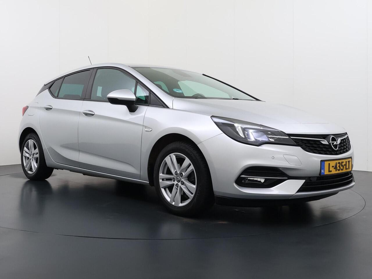 Opel ASTRA 1.4 Launch Elegance VAN ¤ 18.900 ,- VOOR ¤ 15.877,- UW LENTEVOORDEEL ¤ 3.023,-! | AUTOMAAT | AGR STOELEN | CAMERA | STOEL- & STUURWIELVERWARMING | NAVIGATIE | GOED ONDERHOUDEN | AFNEEMBARE TREKHAAK | INCL. 12 MND BOVAG GARANTIE