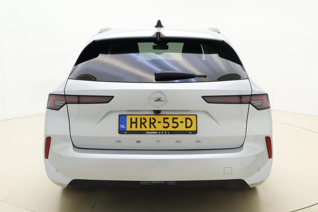 Opel ASTRA Sports Tourer 1.2 Turbo 110pk Business Edition | DEMO | Navigatie | Adaptive Cruise control | Stoel + stuurwielverwarming | Achteruitrijcamera | Getinte ramen