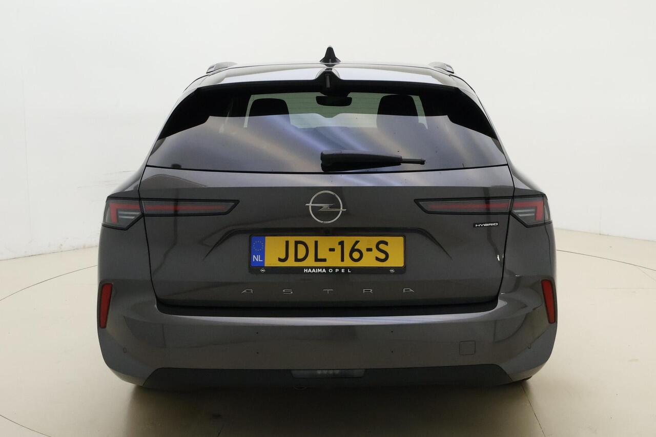 Opel ASTRA Sports Tourer 1.6 Turbo Plug In Hybrid Business Edition | Navigatie | Afneembare trekhaak | 7,4 KW lader | AGR-stoel | 17'' lichtmetalen velgen | Stoelverwarming | 1400 KG trekgewicht