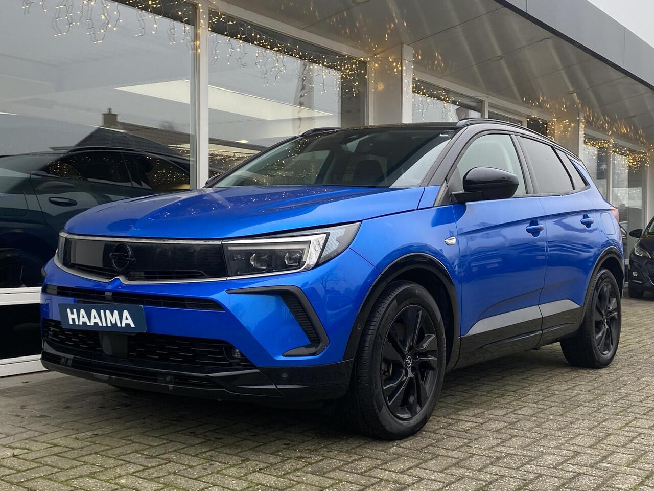 Opel Grandland 1.6 Turbo Plug-In Hybrid GS | AGR Comfortstoelen | Achteruitrijcamera | Parkeersensoren voor en achter | Navigatiesysteem | Voorstoelen verwarmd