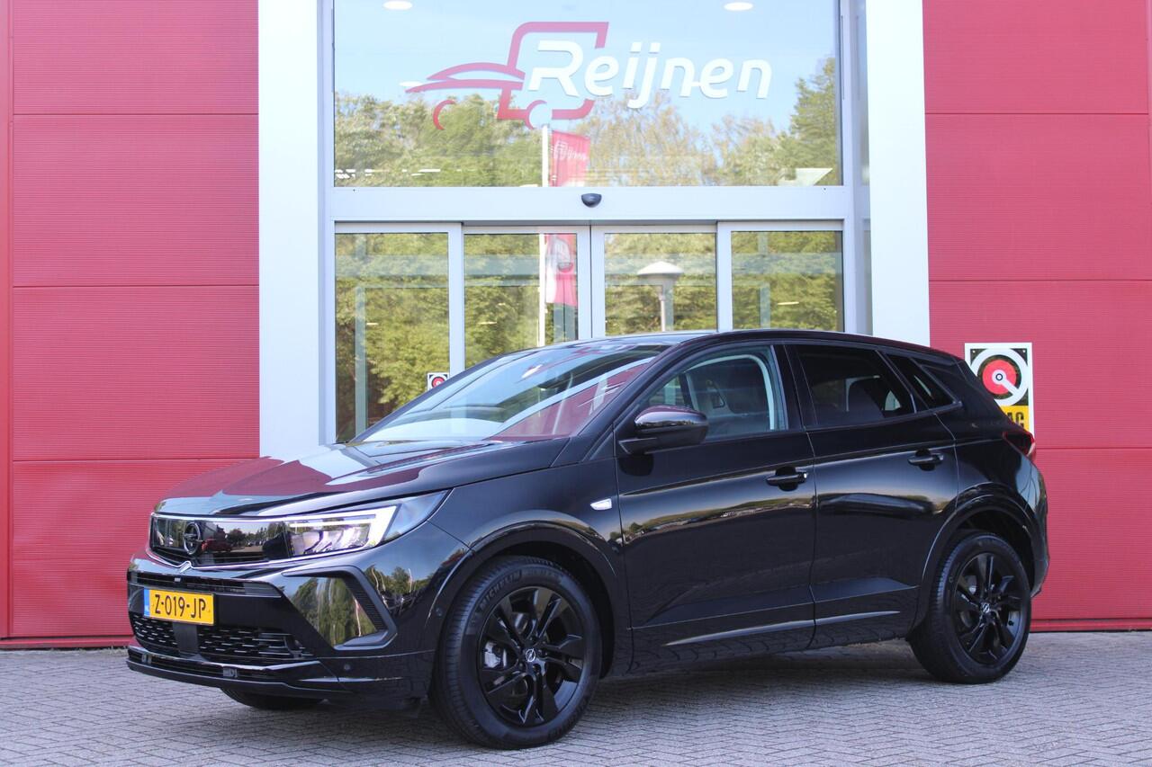 Opel Grandland 1.2 Turbo 136PK AUTOMAAT Hybrid GS | BLACK PACK | STOEL/STUUR VERWARMING | NAVIGATIE | APPLE CARPLAY/ANDROID AUTO | DODEHOEK DETECTIE | 18" LICHTMETALEN VELGEN | DAB+ RADIO | PARKEERSENSOREN VOOR + ACHTER | ADAPTIVE CRUISE CONTROL | ACHTERUITRIJ CAMERA |