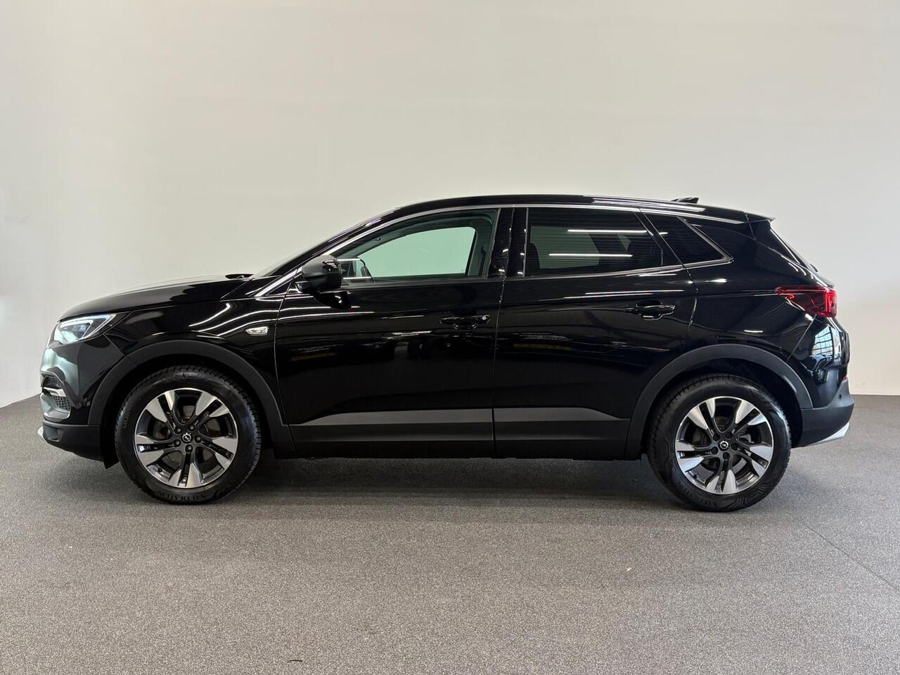 Opel Grandland X 1.2 Turbo Business Executive Panoramadak Navigatie Apple Carplay/Android Auto Camera Parkeersensoren Cruise Control Full Led Stoel- en stuurverwarming Half leder Lichtmetalen velgen Climate Control Getinte ramen