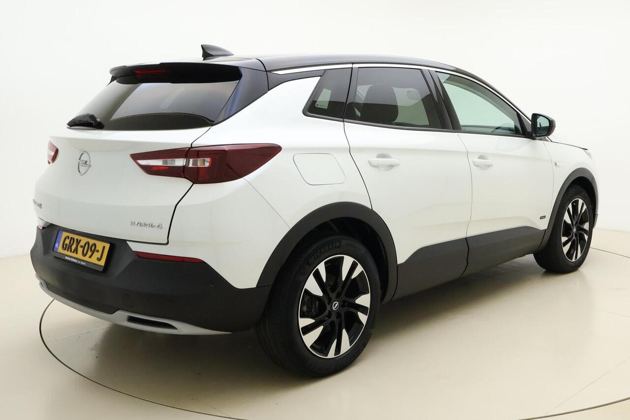 Opel Grandland X 1.6 Turbo 300pk Hybrid4 Elegance | Navigatie | Keyless | 360 Camera | Parelmoer kleur | Electrische achterklep | Lichtmetalen velgen | AGR Comfortstoelen | Verwarmbaar voorraam | Zwart dak