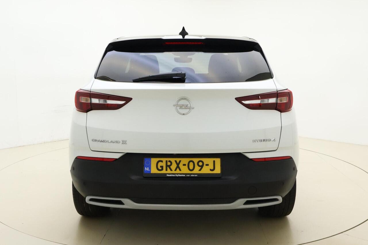 Opel Grandland X 1.6 Turbo 300pk Hybrid4 Elegance | Navigatie | Keyless | Camera | Parelmoer kleur | Electrische achterklep | Lichtmetalen velgen | AGR Comfortstoelen | Voorruitverwarming | Zwart dak