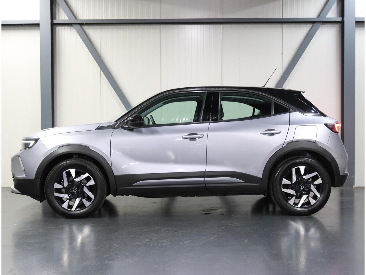 Opel MOKKA Mokka-e Elegance 50-kWh 136PK | AppleCarPlay/AndroidAuto | Cruise Control | Climate Control | Camera | Digitale Cockpit | Navigatie | FULL LED | TwoTone | Isofix | Armsteun |