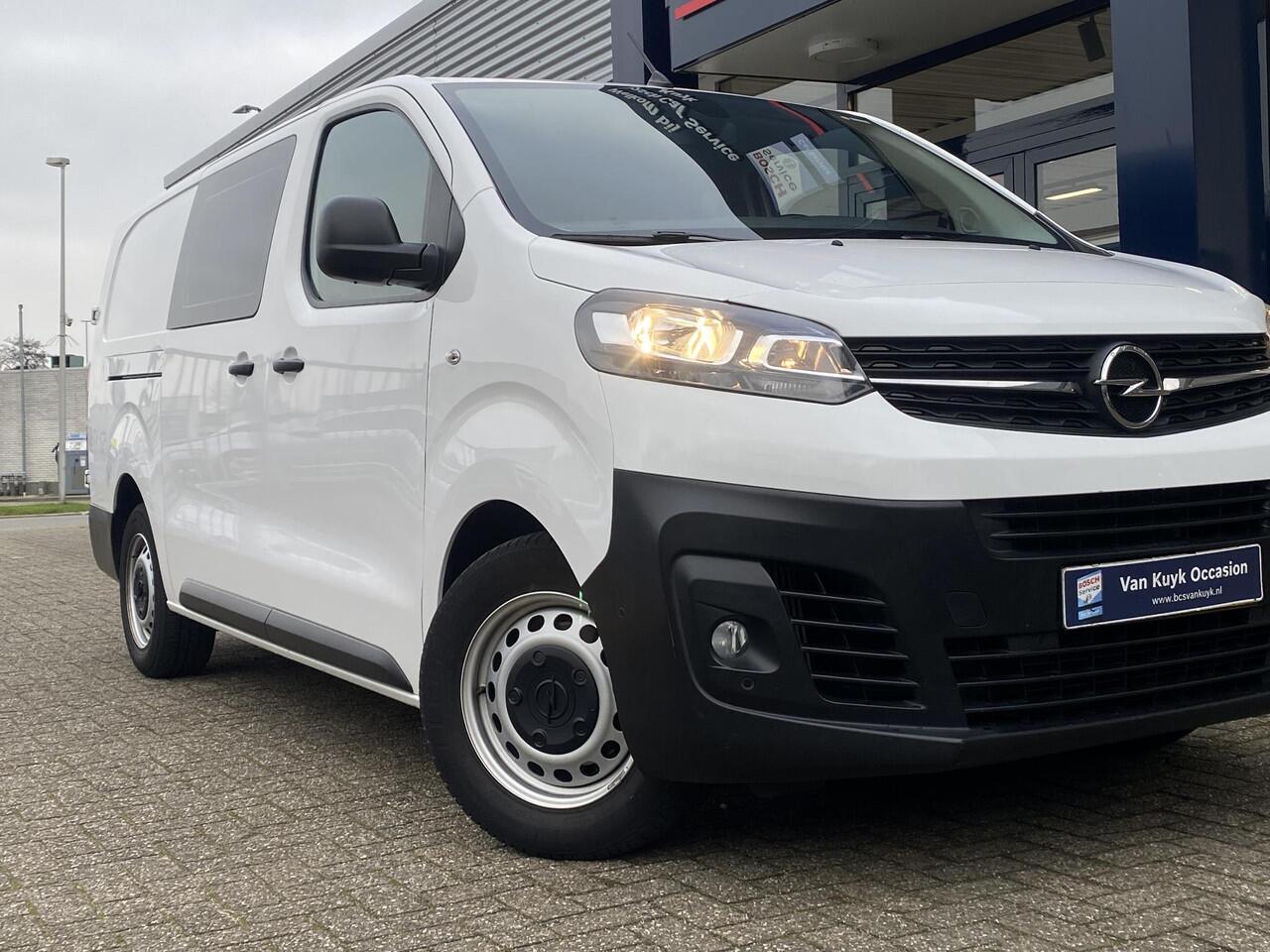 Opel VIVARO 1.5 CDTI L3H1 DC Selection / 6-Persoons / Cruise-Control / Trekhaak / Zijschuifdeur-Rechts / Houten-Vloer / Zijwandbekleding / Apple-Carplay & Android-Auto / Navi / Radio-Bluetooth / Airco / 16'' All-Seasons / ENZ.