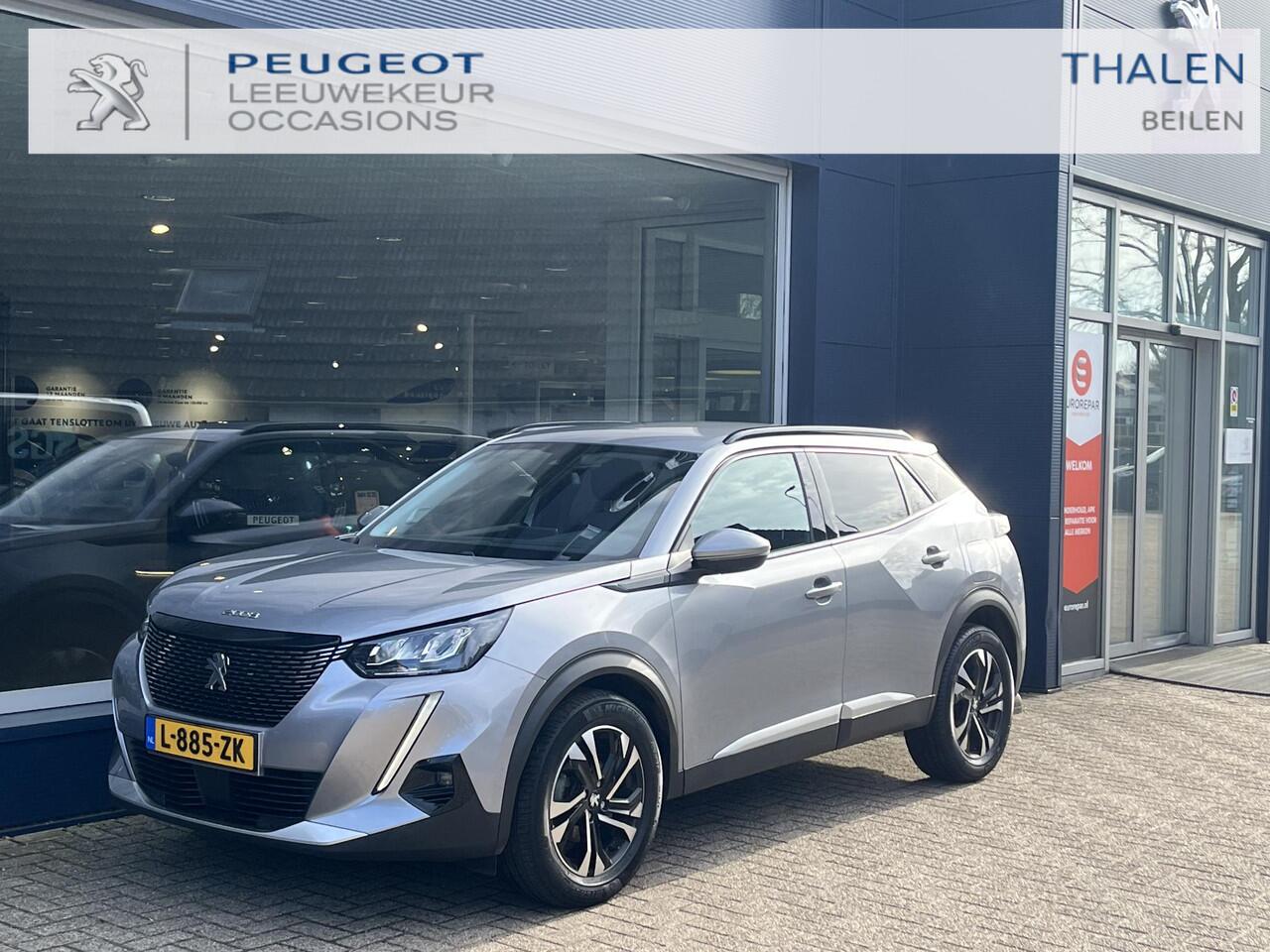 Peugeot 2008 1.2 Turbo 130 PK Allure Pack | 1e Eigenaarsauto met slechts 35.500 KM | Hoge Zitpositie | Navigatie | Climate Control | Keyless Entry | Draadloze Telefoonlader | Digitaal Dashboard | Camera | Parkeersensoren V+A | LED Verlichting | 17" Lichtmetalen Velgen