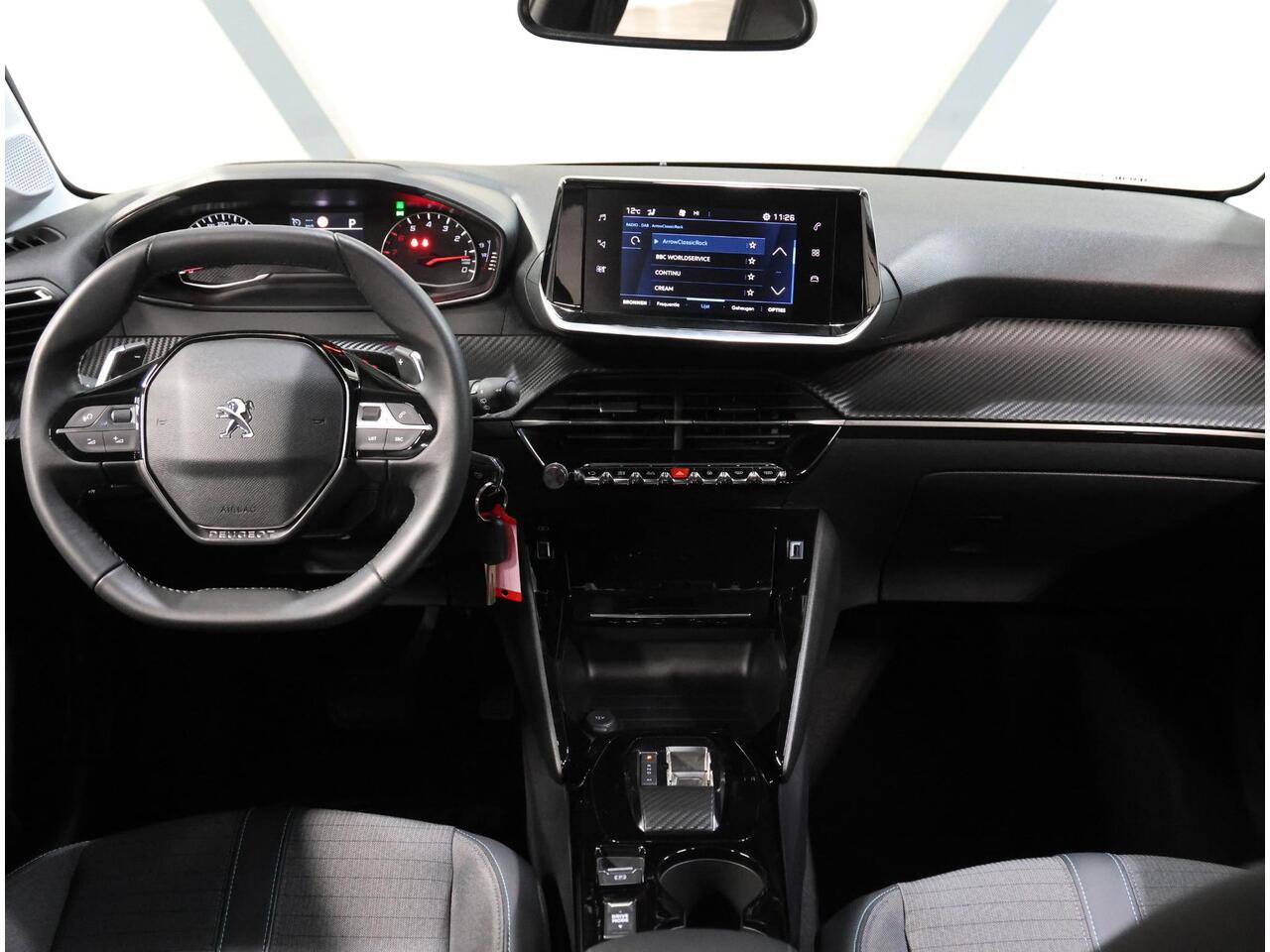 Peugeot 208 100PK Allure | 1ste eigenaar | LEER/Stof | Parkeersensoren | AppleCarPlay/Android | AUTOMAAT | FULL LED | Lederen Stuurwiel | Climate Control | Cruise Control | 16" LMV | Isofix | Privacy Glass |