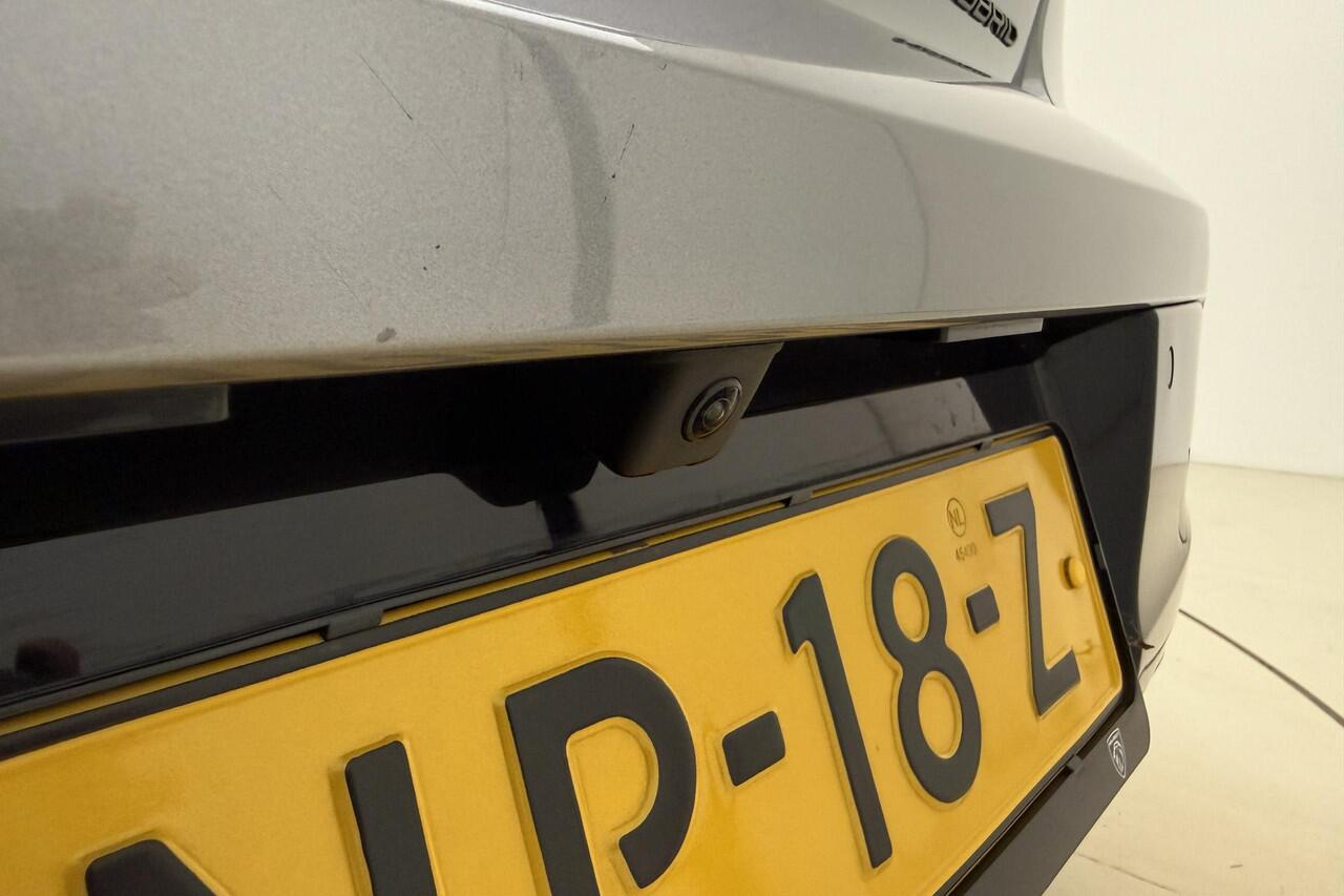 Peugeot 208 Hybrid e-DCS6 Allure 100 PK | Automaat | Parkeersensor rondom | Camera | Mirror Screen | Adaptieve Cruise Control | Airco | 1e eigenaar