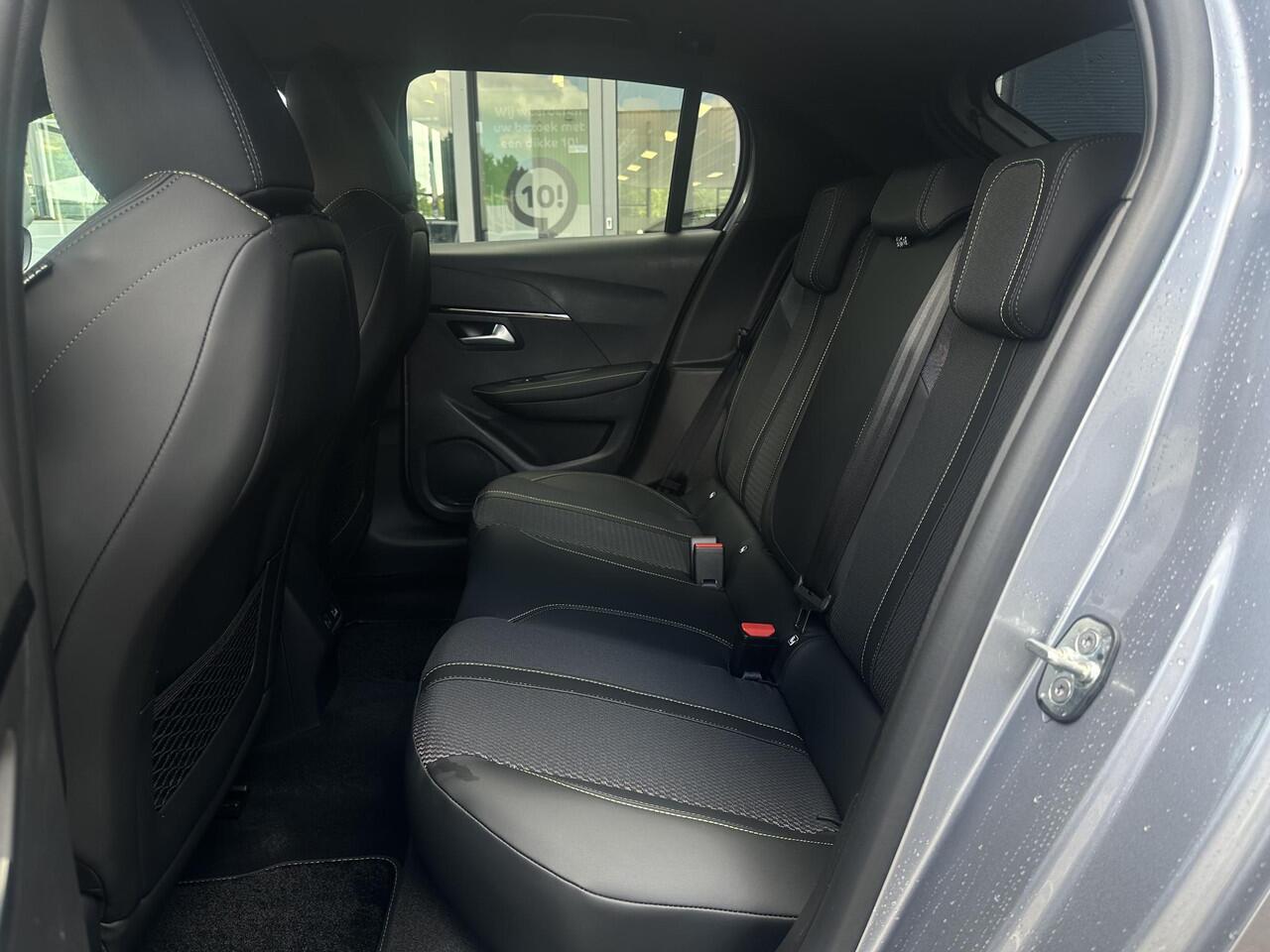 Peugeot 208 Hybrid 145 e-DCS6 GT | Parkeercamera/-sensoren (voor/achter) | Keyless Entry/Start | Dodehoek | Sfeerverlichting | Climate Control | Draadloze telefoonlader | Apple Carplay/Android Auto | Adaptive Cruise Control |