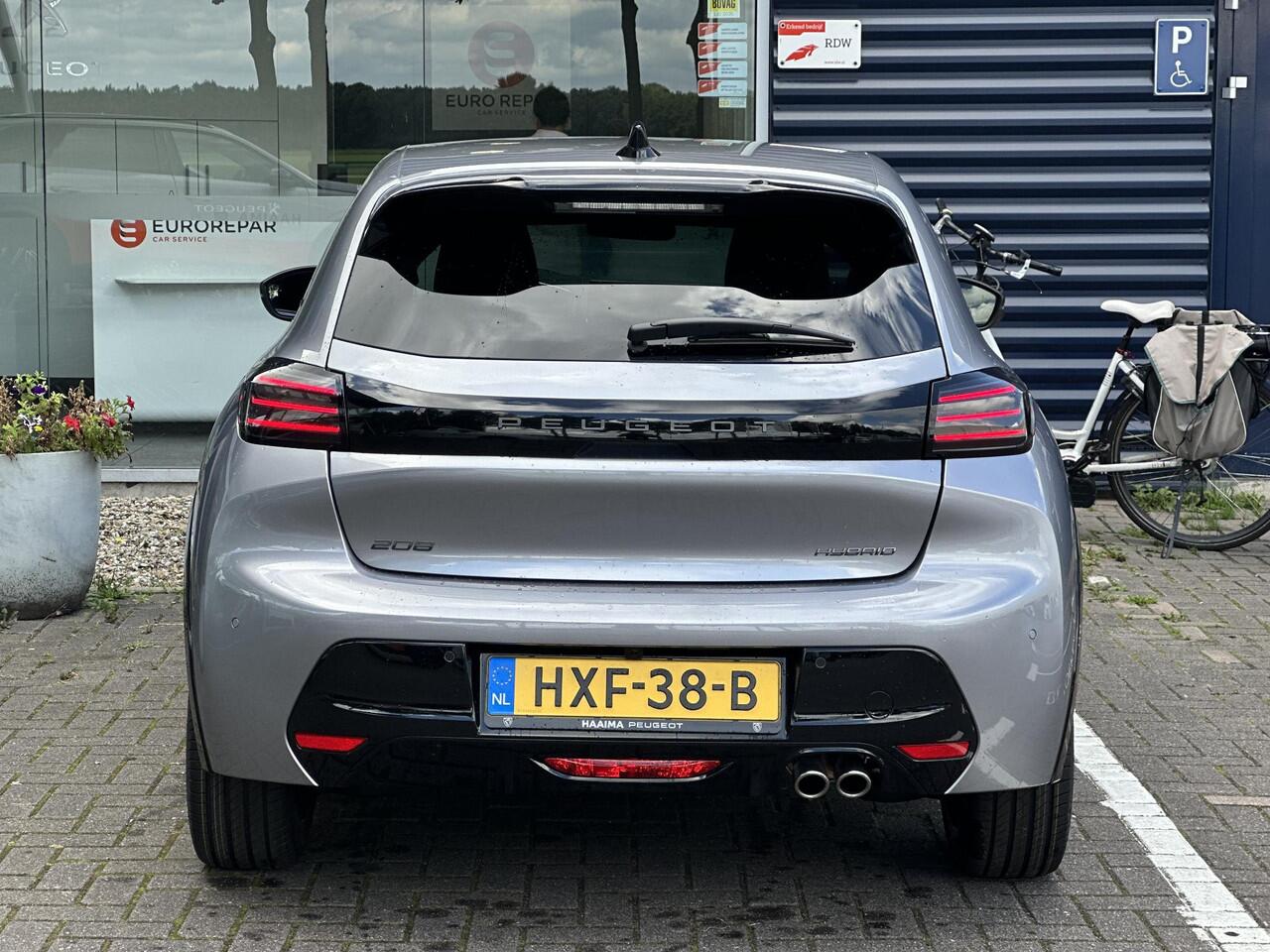 Peugeot 208 Hybrid 145 e-DCS6 GT | Parkeercamera/-sensoren (voor/achter) | Keyless Entry/Start | Dodehoek | Sfeerverlichting | Climate Control | Draadloze telefoonlader | Apple Carplay/Android Auto | Adaptive Cruise Control |