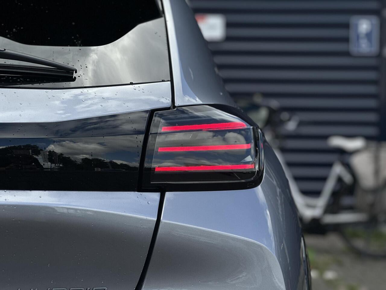 Peugeot 208 Hybrid 145 e-DCS6 GT | Parkeercamera/-sensoren (voor/achter) | Keyless Entry/Start | Dodehoek | Sfeerverlichting | Climate Control | Draadloze telefoonlader | Apple Carplay/Android Auto | Adaptive Cruise Control |